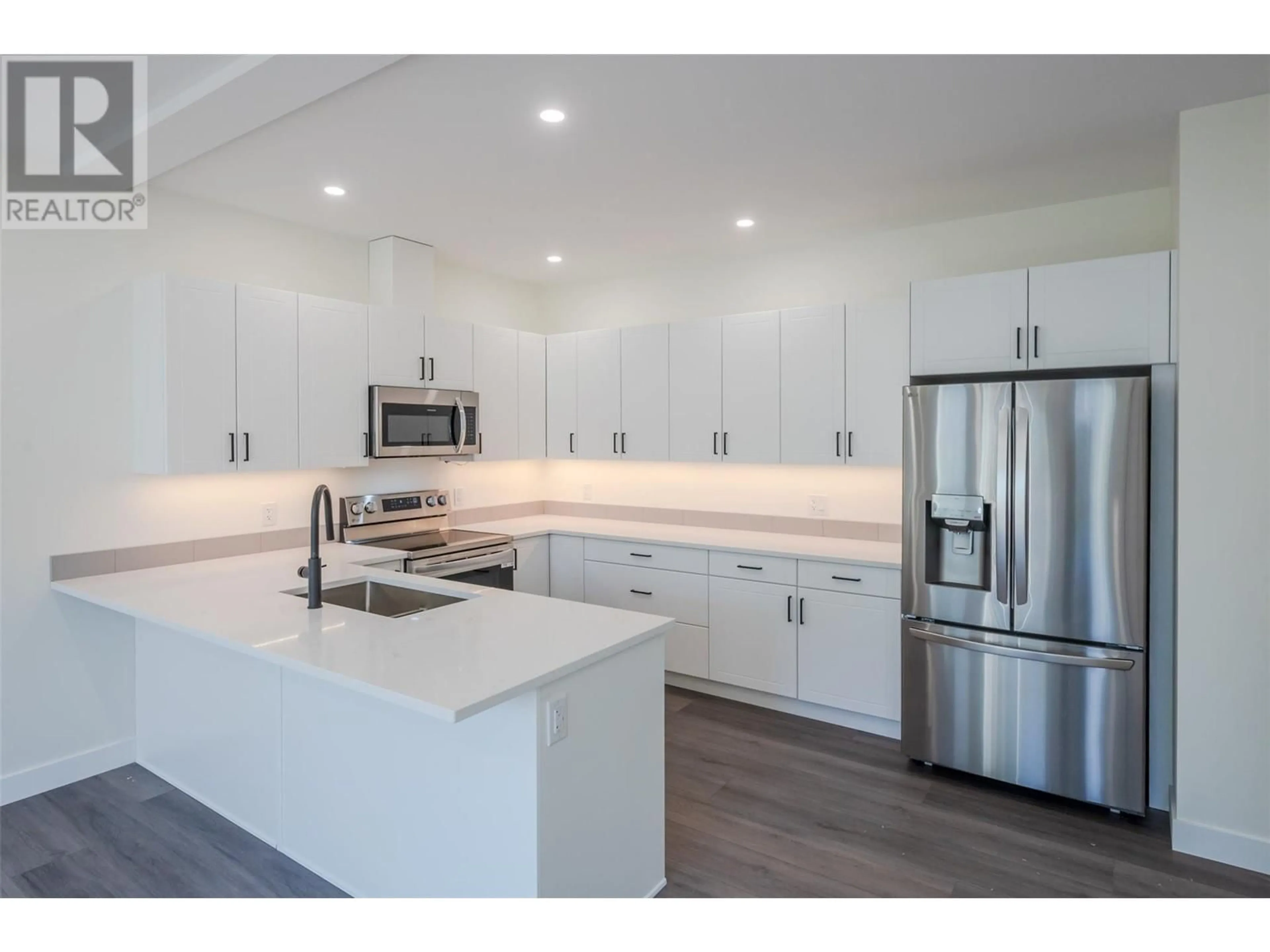 Open concept kitchen, unknown for 102 - 11610 VICTORIA ROAD SOUTH, Summerland British Columbia V0H1Z2