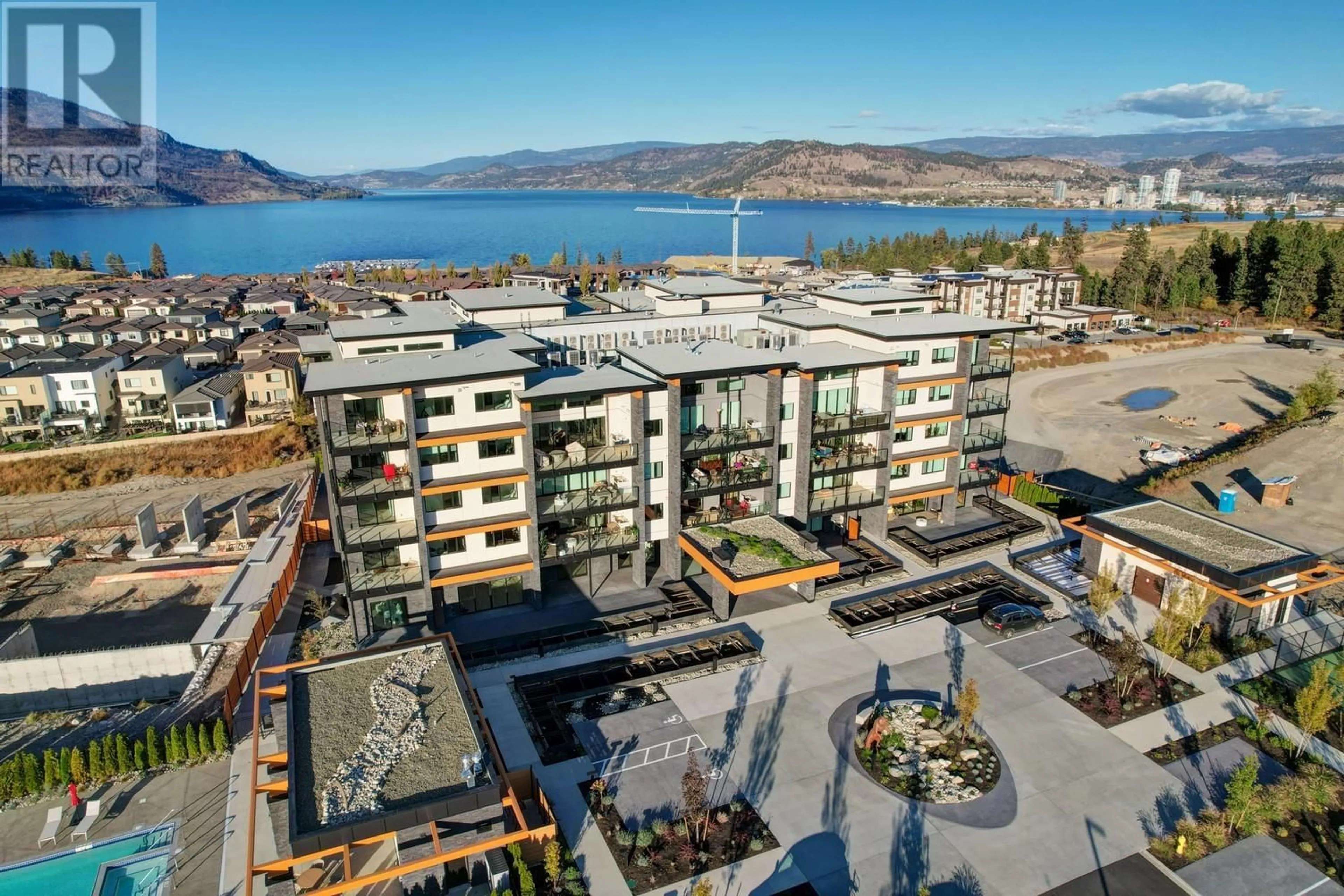 A pic from outside/outdoor area/front of a property/back of a property/a pic from drone, unknown for 3503 - 3000 ARIVA DRIVE, Kelowna British Columbia V1Z0B3