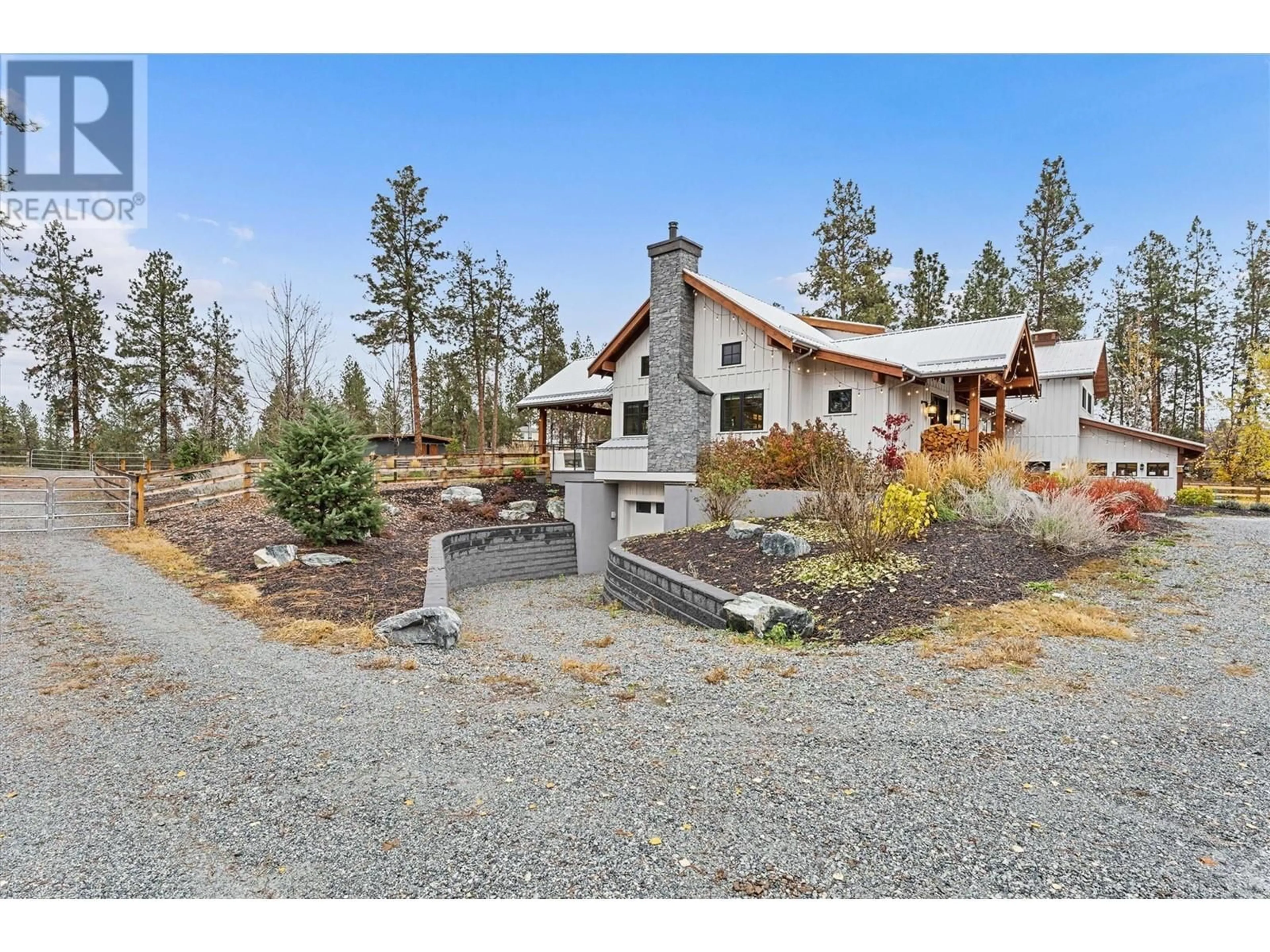 A pic from outside/outdoor area/front of a property/back of a property/a pic from drone, mountain view for 2150 SAUCIER ROAD, Kelowna British Columbia V1W4C1