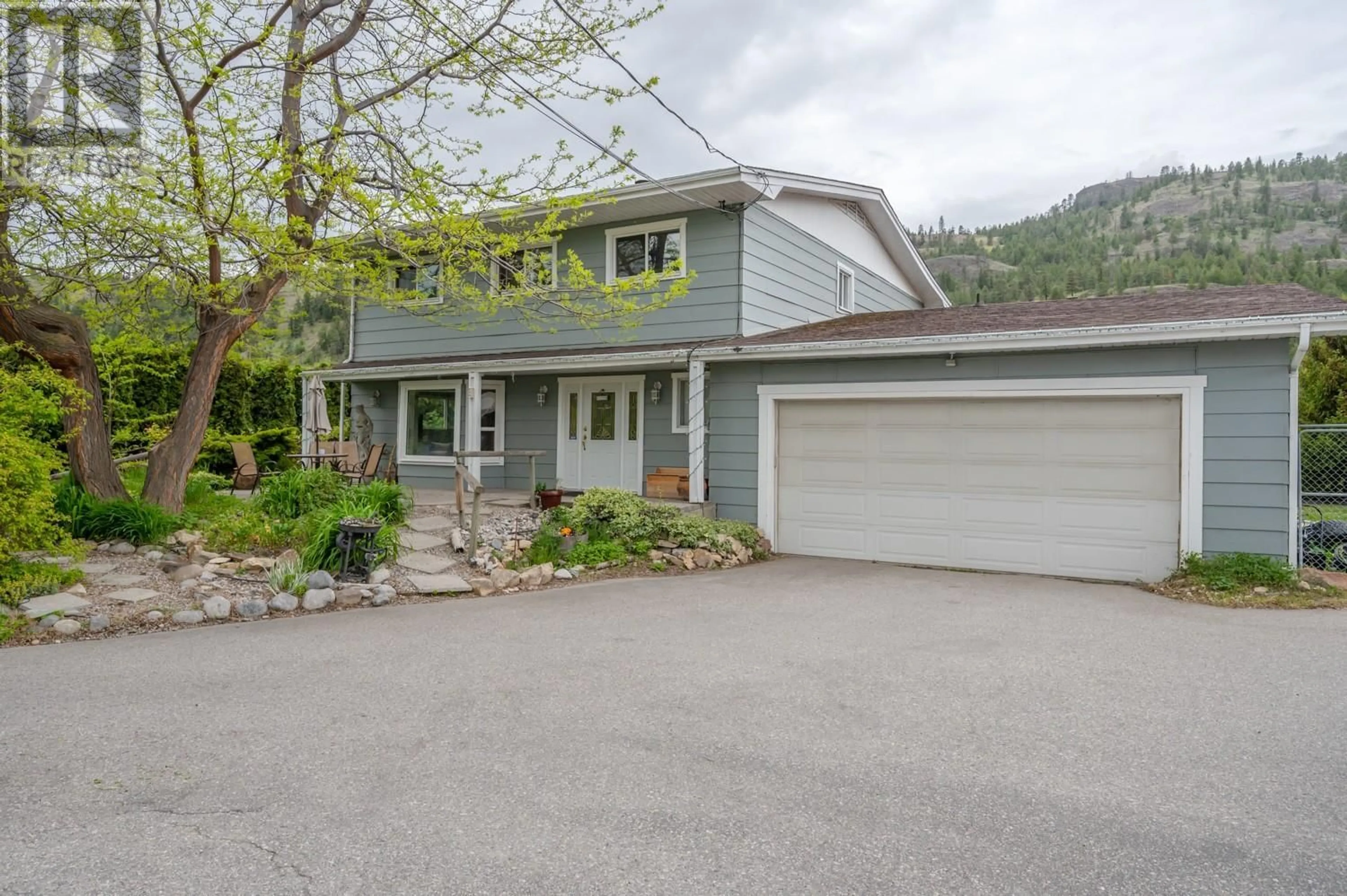 A pic from outside/outdoor area/front of a property/back of a property/a pic from drone, street for 14892 GARNET AVENUE, Summerland British Columbia V0H1Z3
