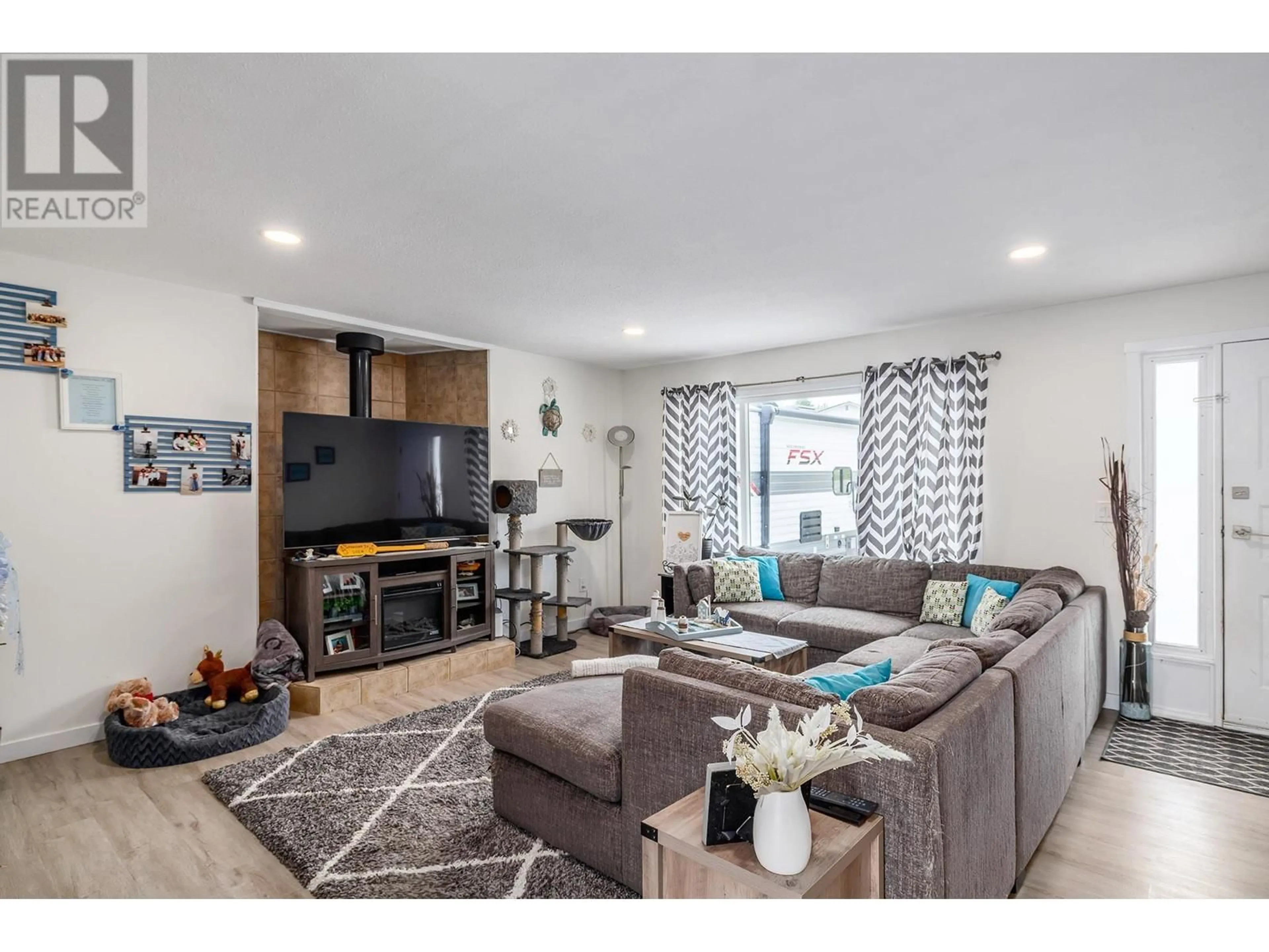 Living room with furniture, unknown for GLENWAY ROAD, West Kelowna British Columbia V4T1E2