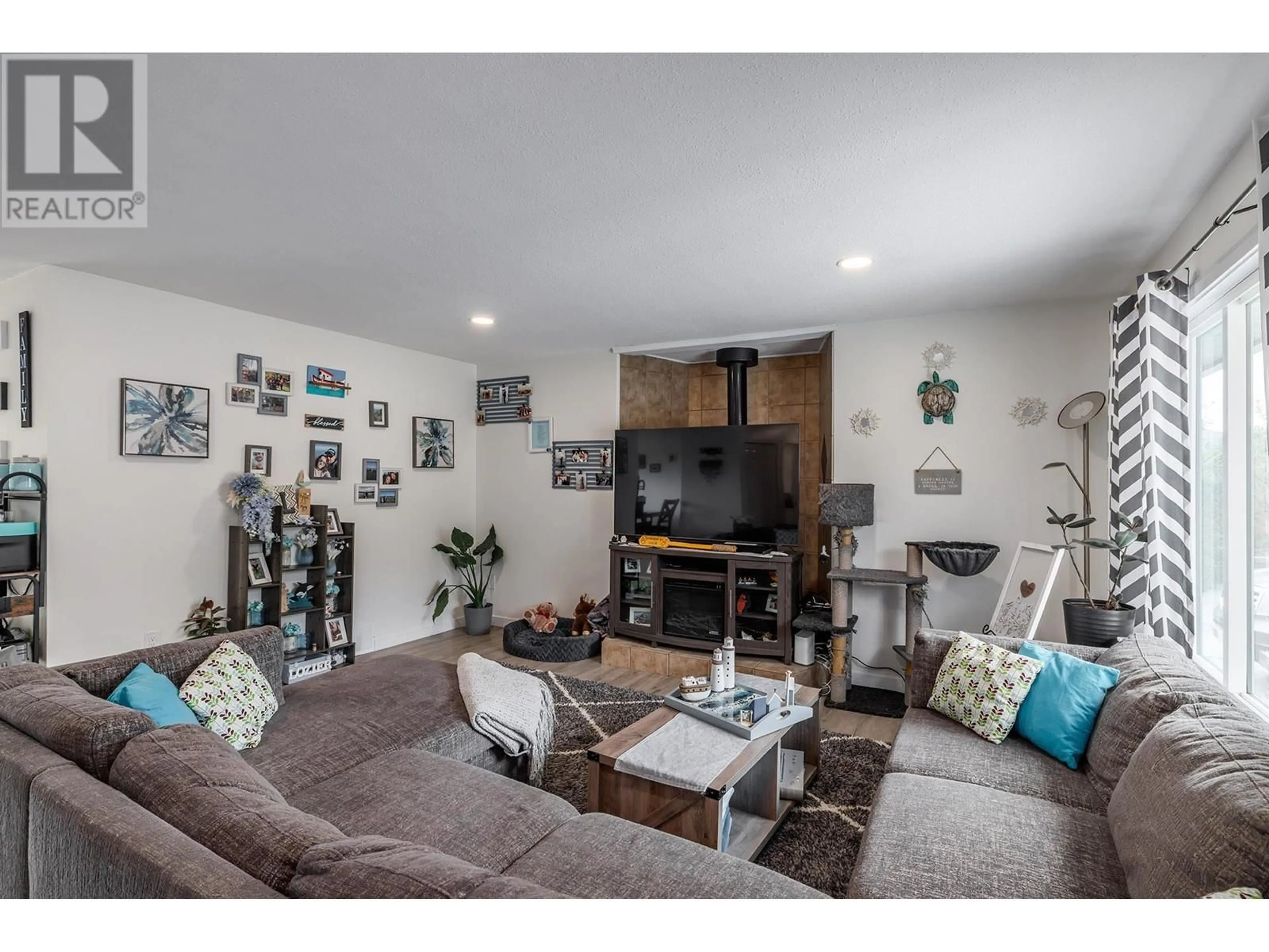 Living room with furniture, unknown for GLENWAY ROAD, West Kelowna British Columbia V4T1E2