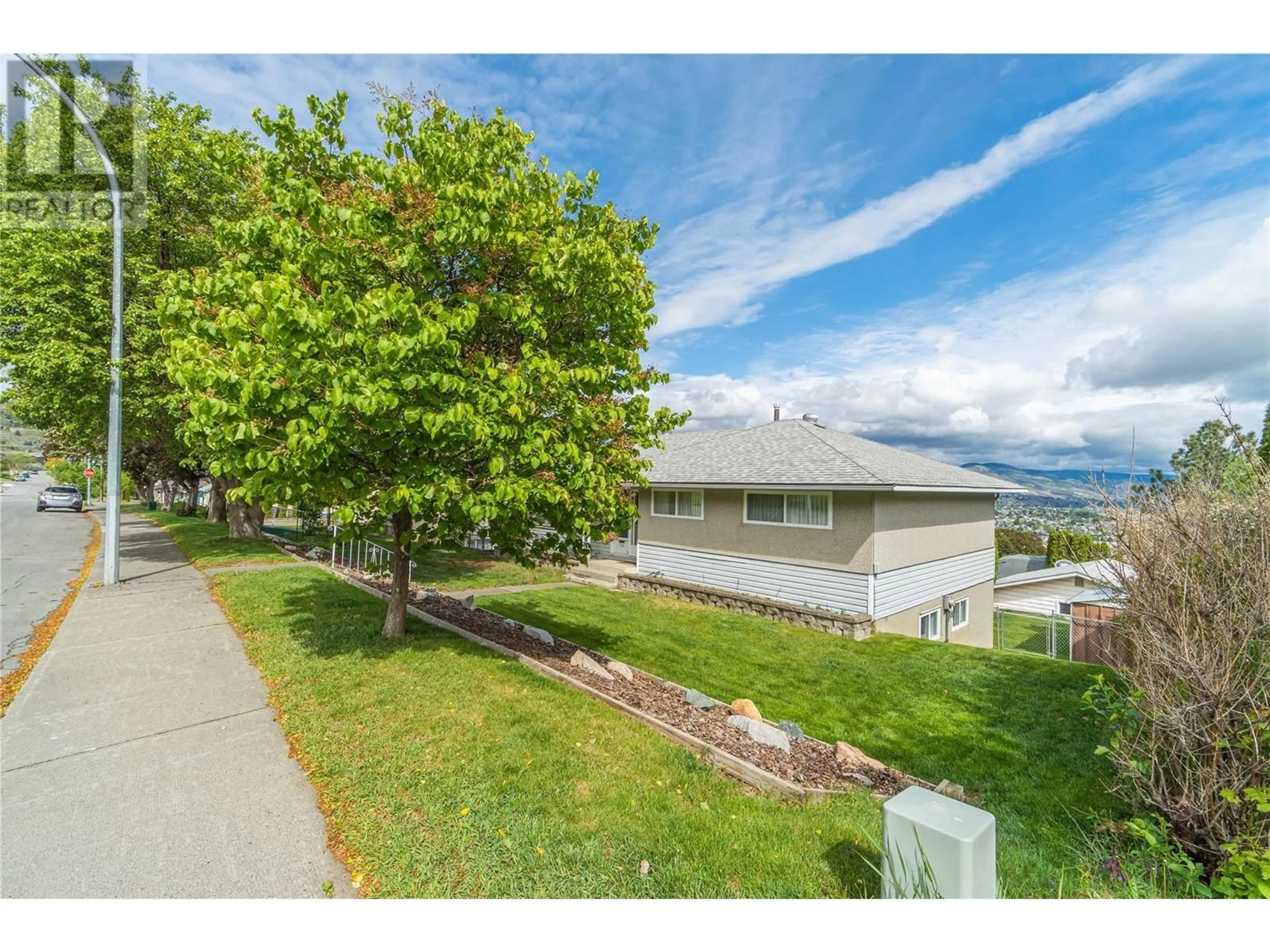 A pic from outside/outdoor area/front of a property/back of a property/a pic from drone, mountain view for 514 BATTLE STREET WEST, Kamloops British Columbia V2C1H2
