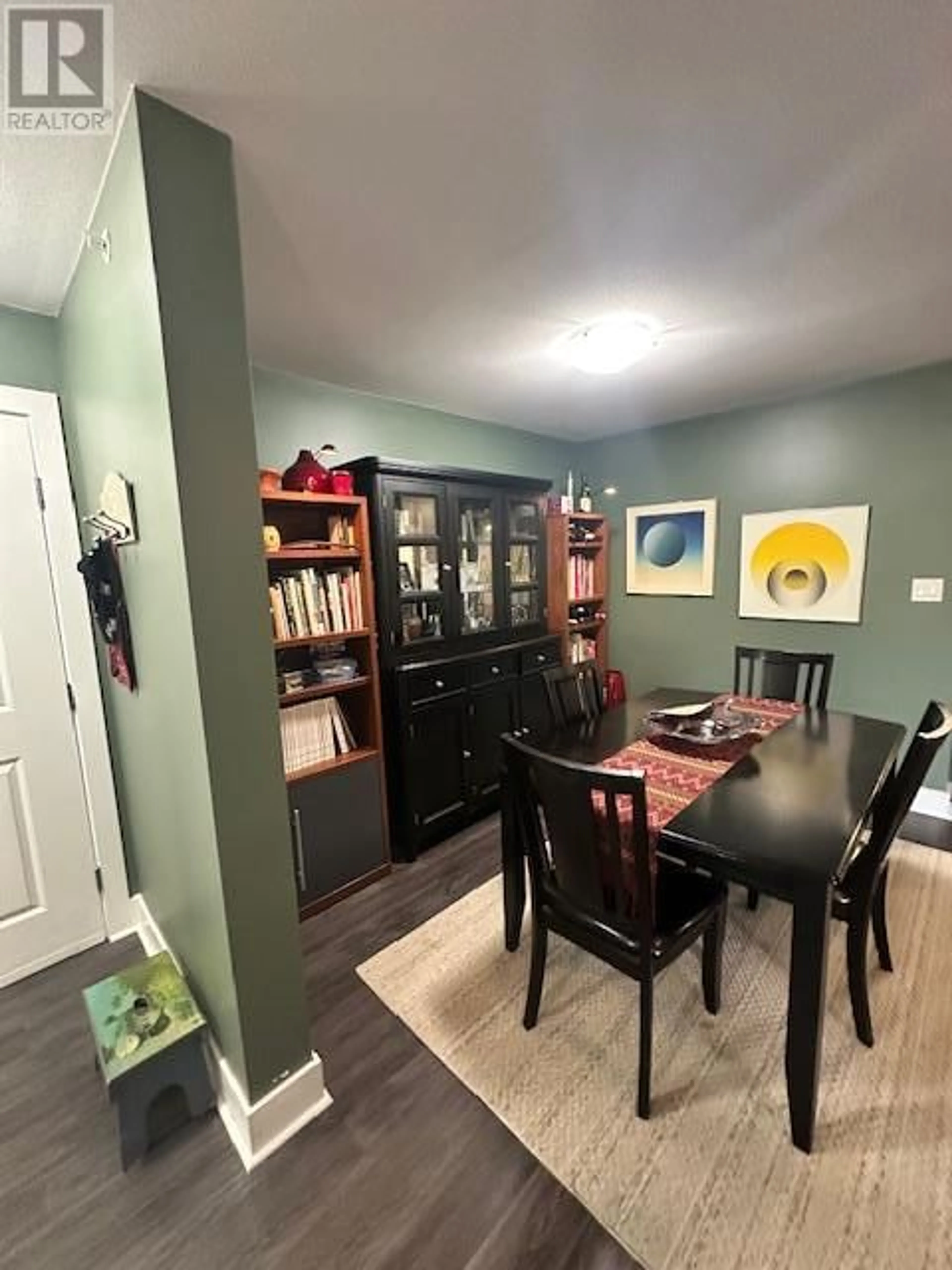 Dining room, wood/laminate floor for 402 - 256 HASTINGS AVENUE, Penticton British Columbia V2A2V6