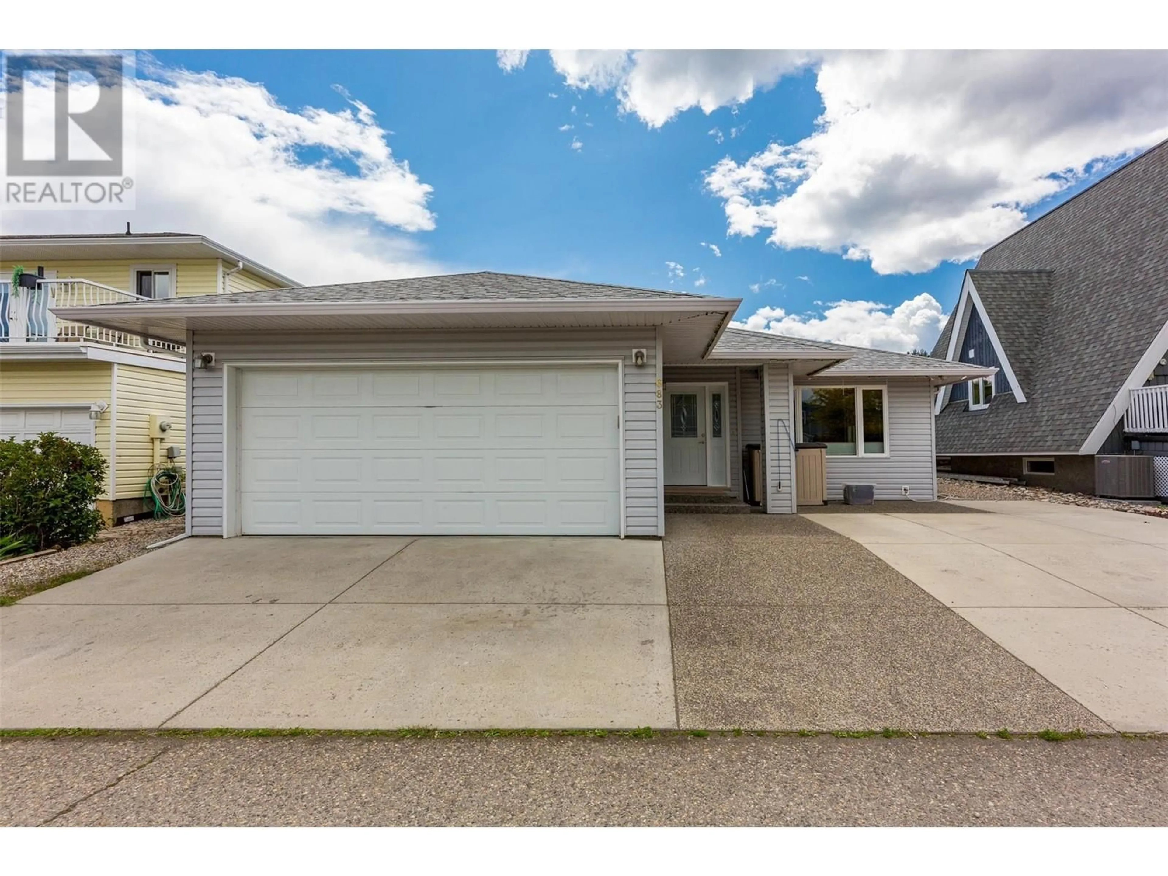 Home with vinyl exterior material, street for 683 COUGAR STREET, Vernon British Columbia V1H2A1
