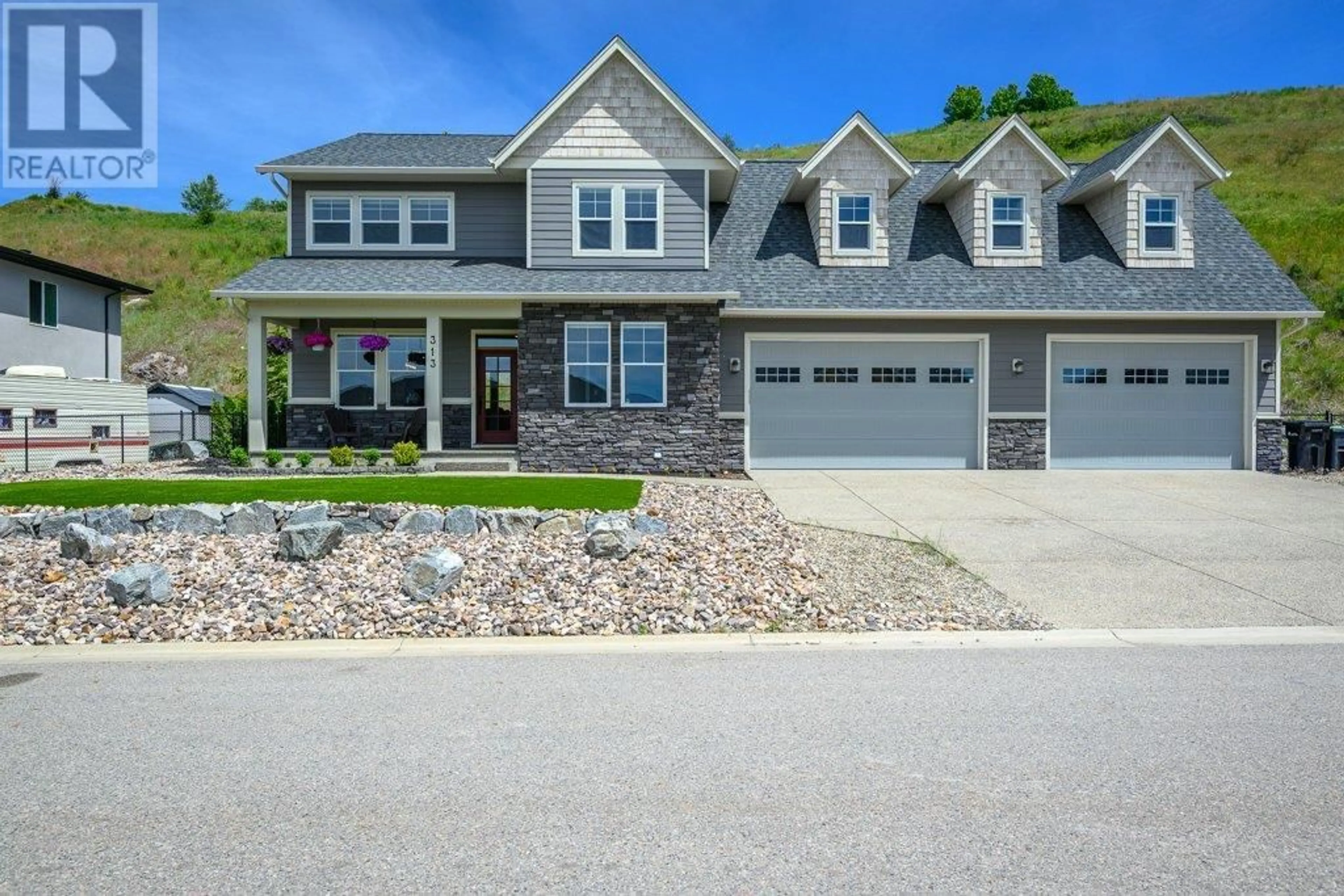 Home with vinyl exterior material, street for 313 BALDY PLACE, Vernon British Columbia V1B0A3