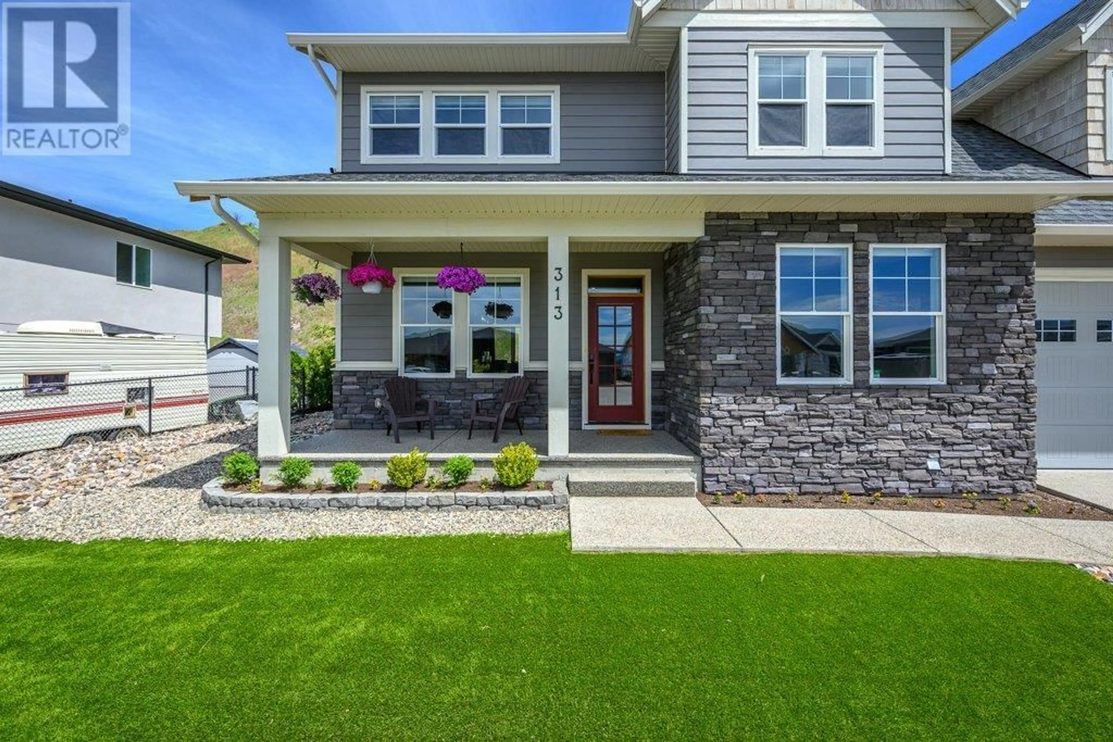 Home with vinyl exterior material, street for 313 BALDY PLACE, Vernon British Columbia V1B0A3