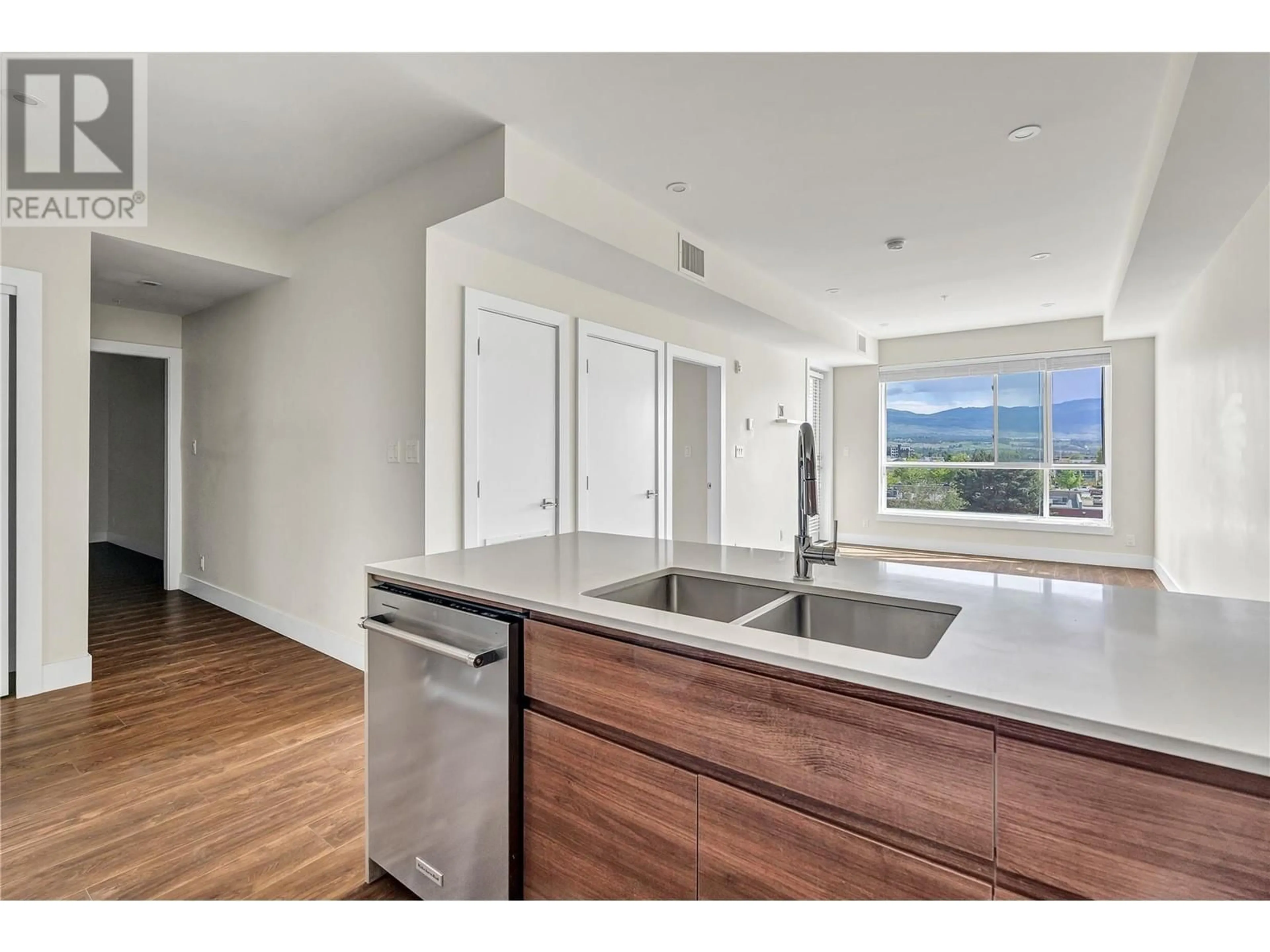 Open concept kitchen, unknown for 412 - 1925 ENTERPRISE WAY, Kelowna British Columbia V1Y0J8