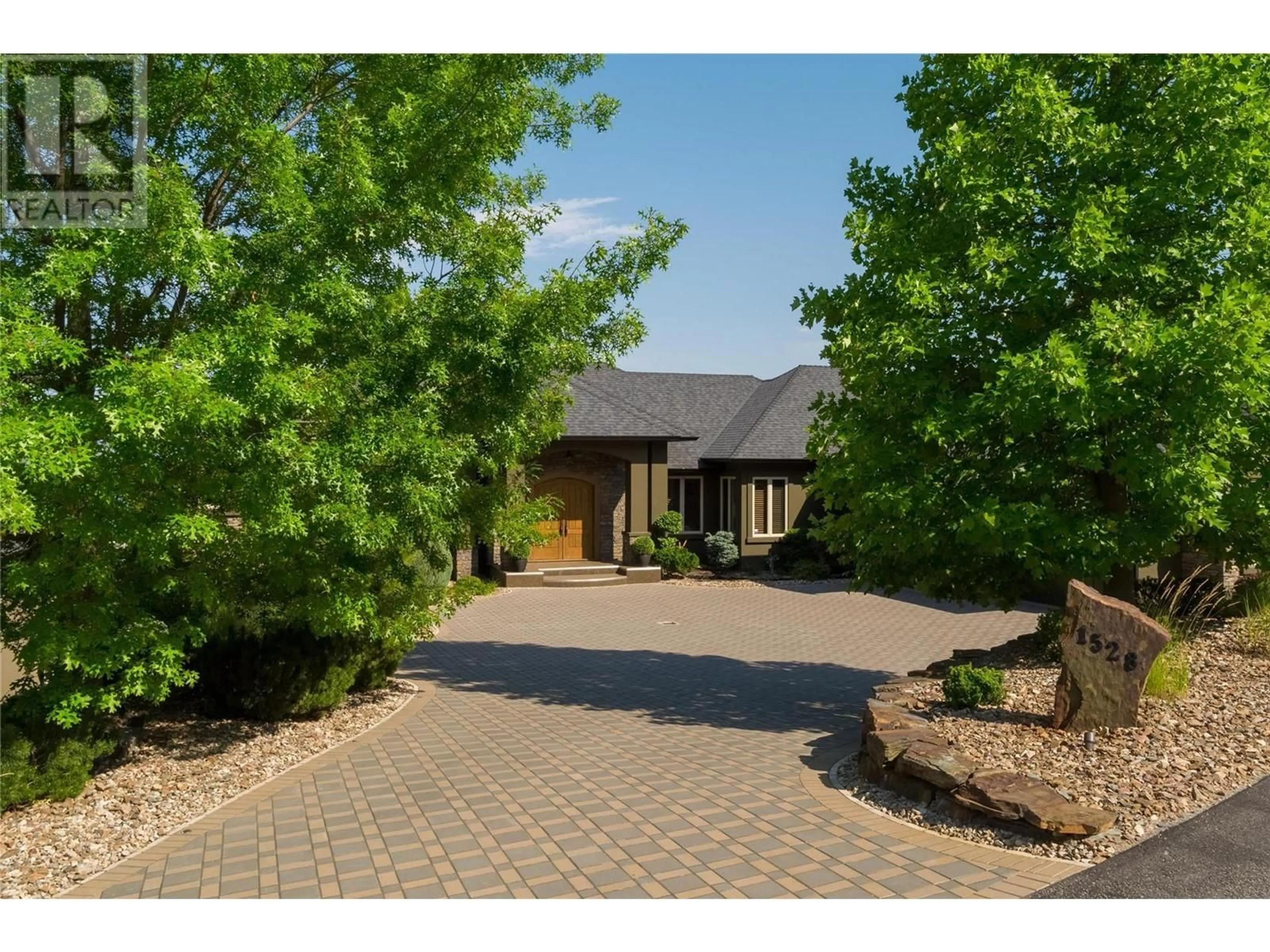A pic from outside/outdoor area/front of a property/back of a property/a pic from drone, street for 1528 VINEYARD DRIVE, West Kelowna British Columbia V4T2Y7