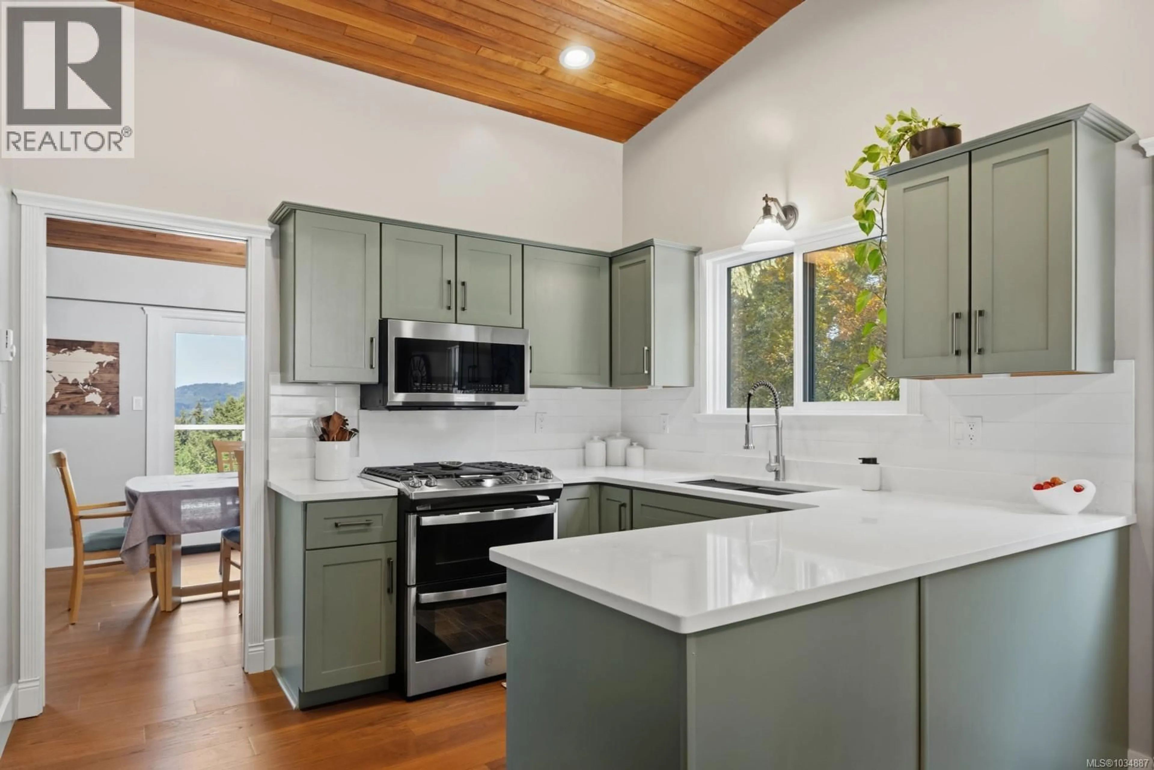 Open concept kitchen, ceramic/tile floor for 1415 KINGSVIEW ROAD, Duncan British Columbia V9L5P1