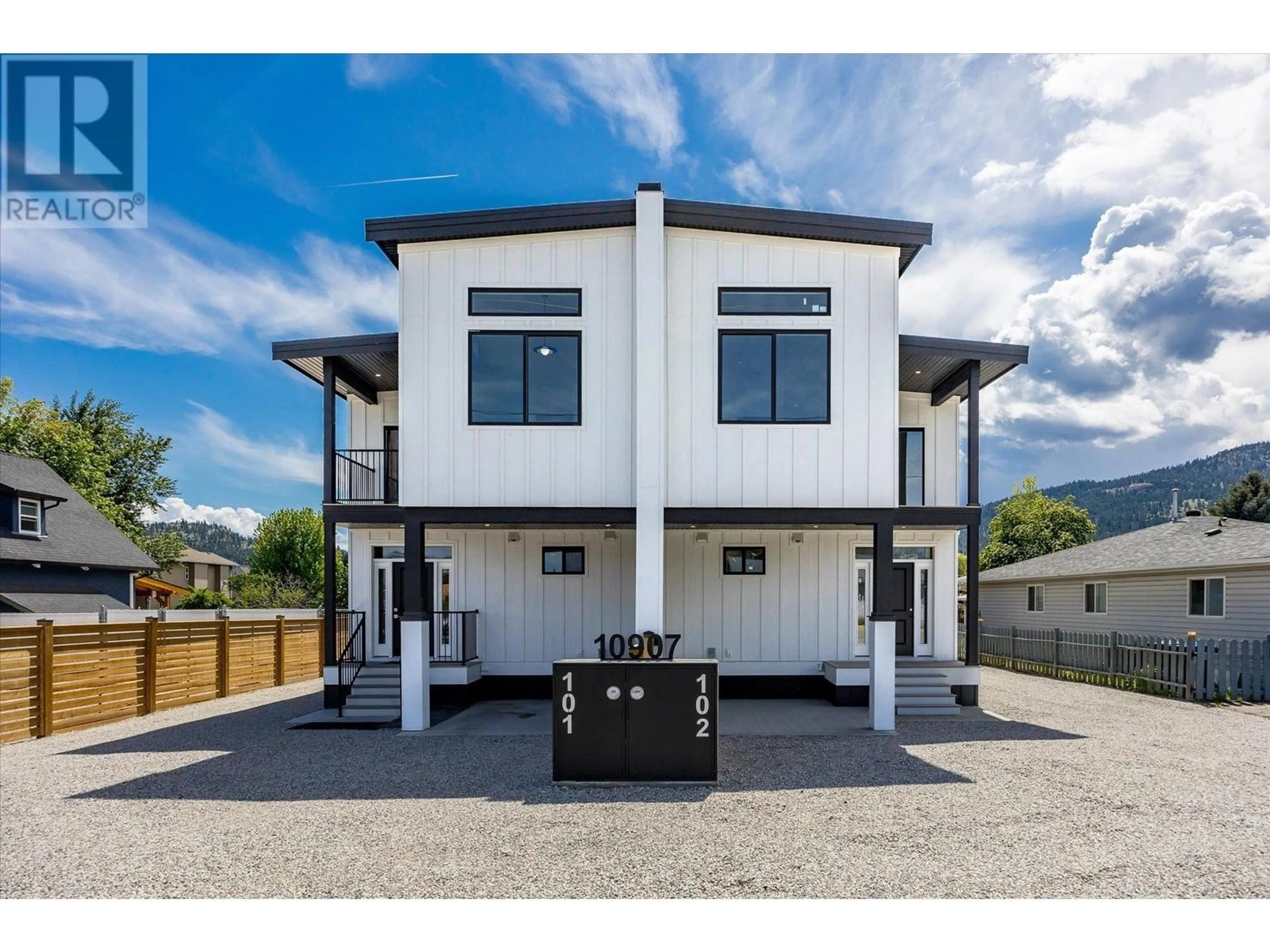 Home with vinyl exterior material, street for 10907 PRAIRIE VALLEY ROAD, Summerland British Columbia V0H1Z8