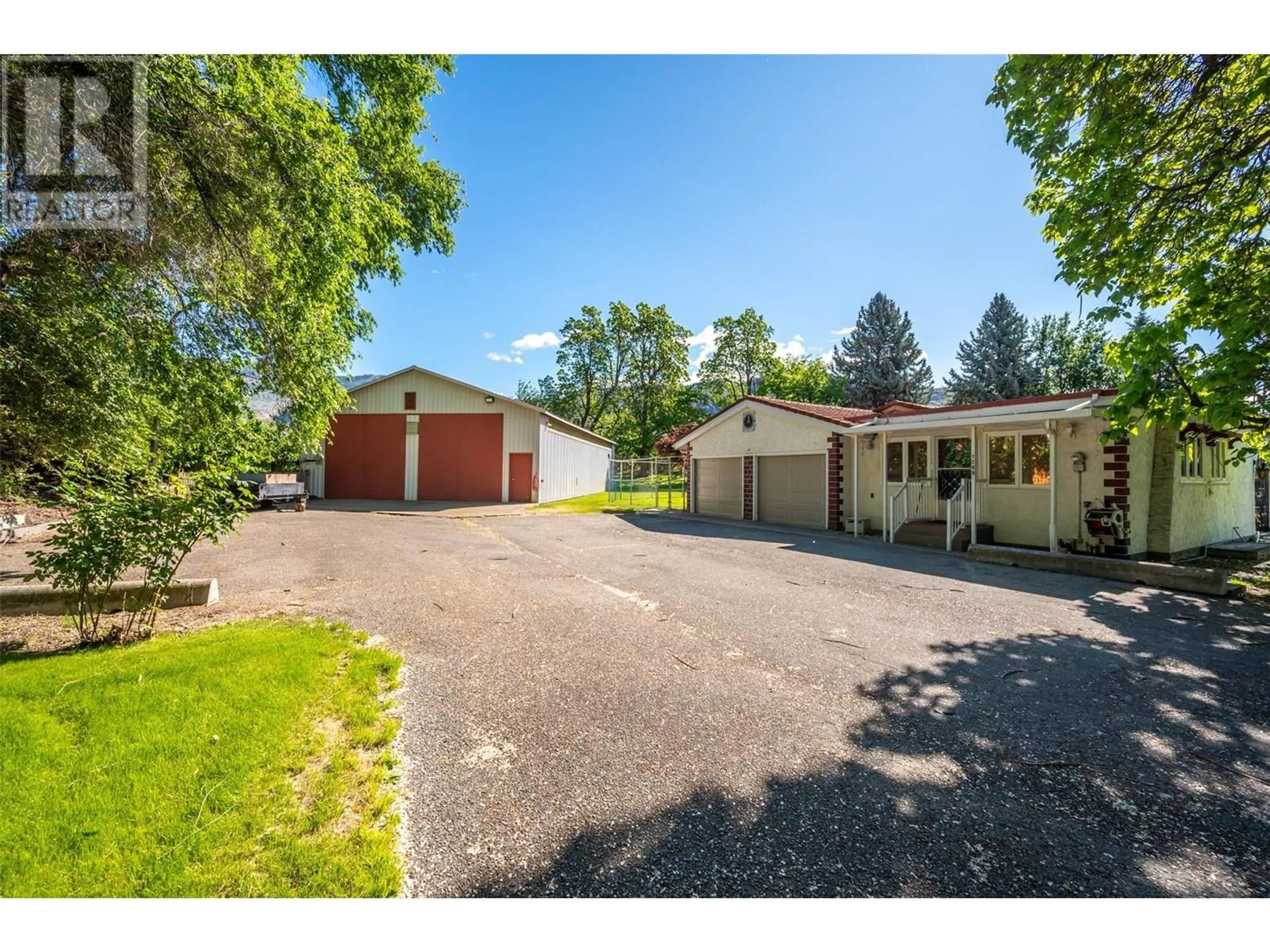 A pic from outside/outdoor area/front of a property/back of a property/a pic from drone, street for 1209 LAKESHORE DRIVE, Osoyoos British Columbia V0H1V6