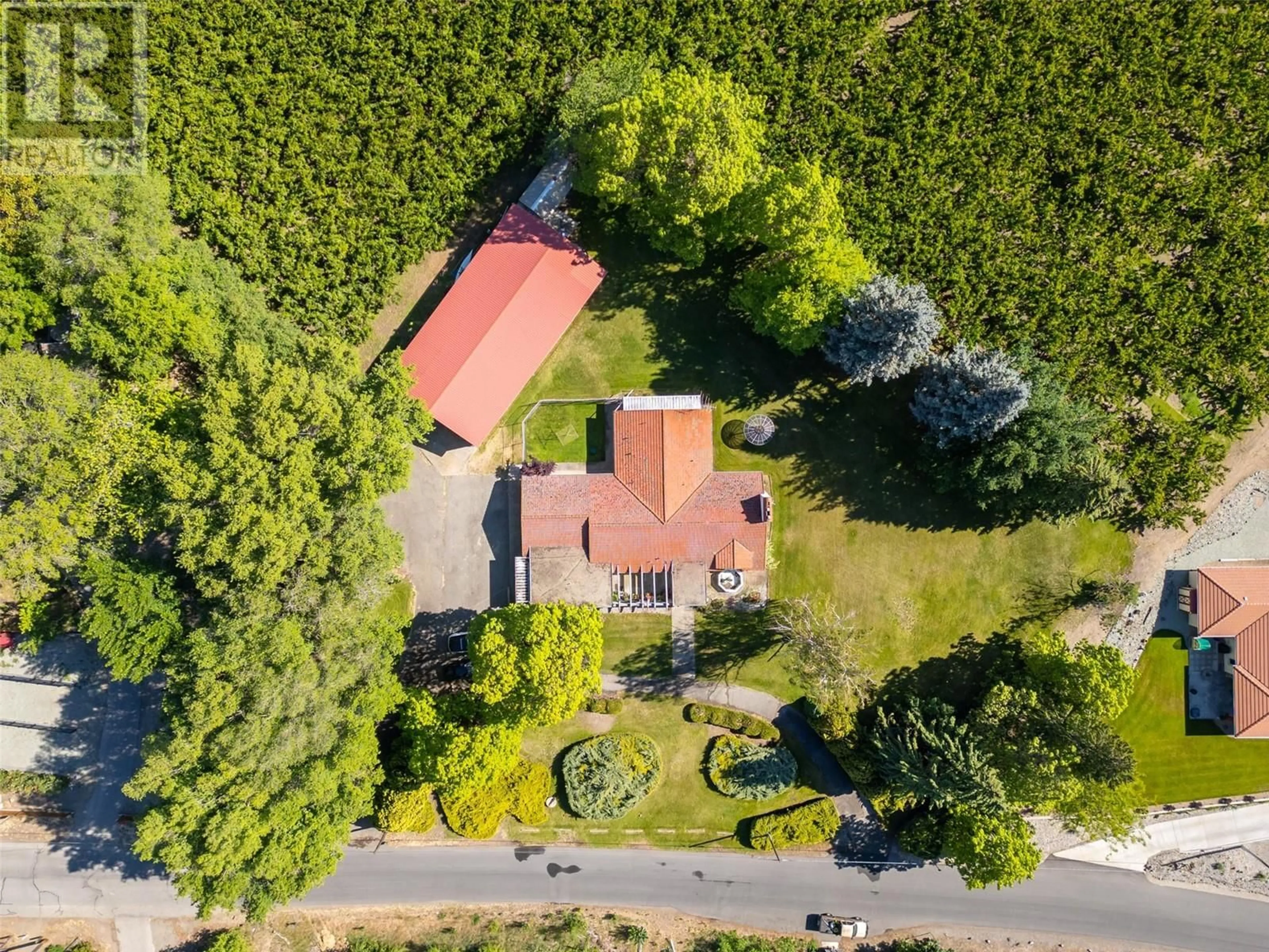 A pic from outside/outdoor area/front of a property/back of a property/a pic from drone, forest/trees view for 1209 LAKESHORE DRIVE, Osoyoos British Columbia V0H1V6