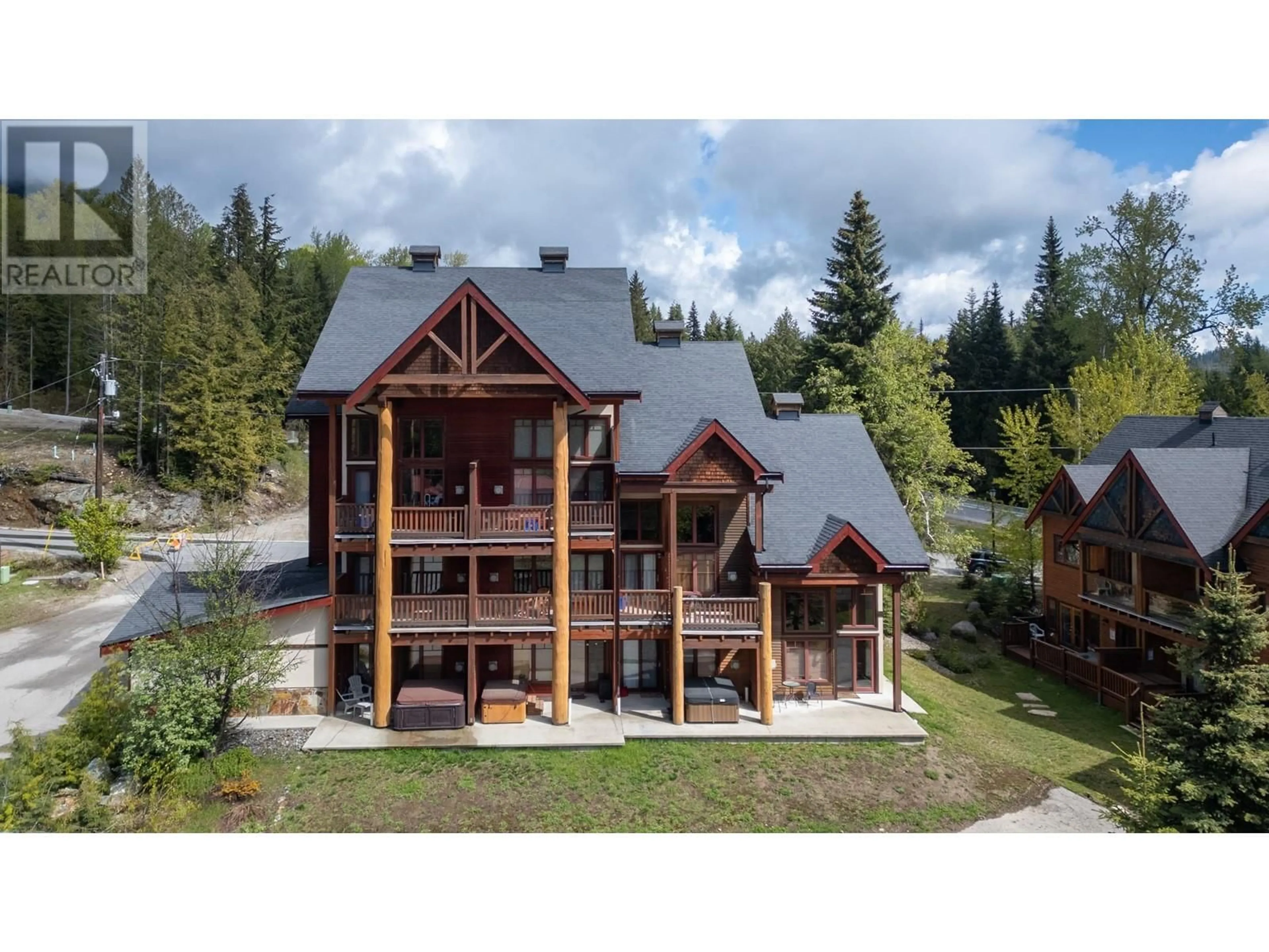 A pic from outside/outdoor area/front of a property/back of a property/a pic from drone, unknown for 1A - 1080 OLAUS WAY, Rossland British Columbia V0G1Y0