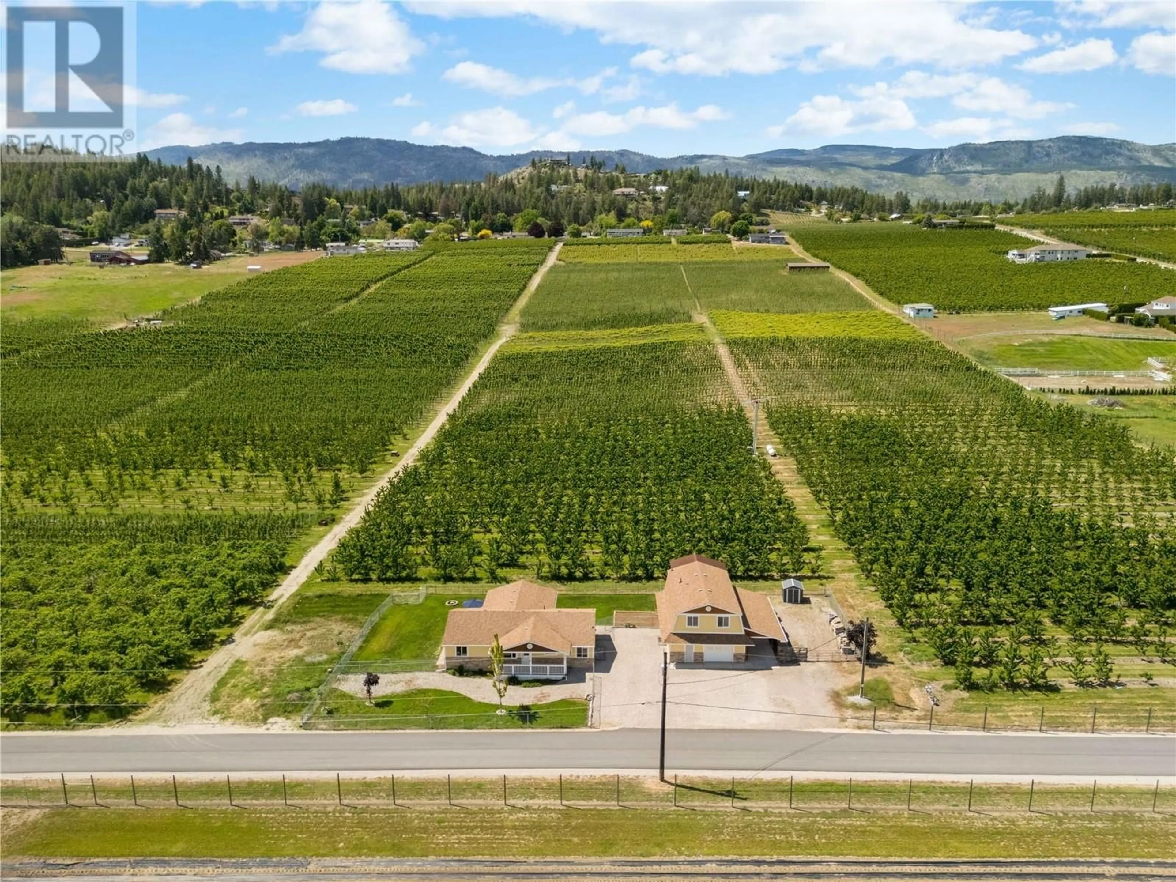 A pic from outside/outdoor area/front of a property/back of a property/a pic from drone, mountain view for 10484 SEATON ROAD, Lake Country British Columbia V4V1K4