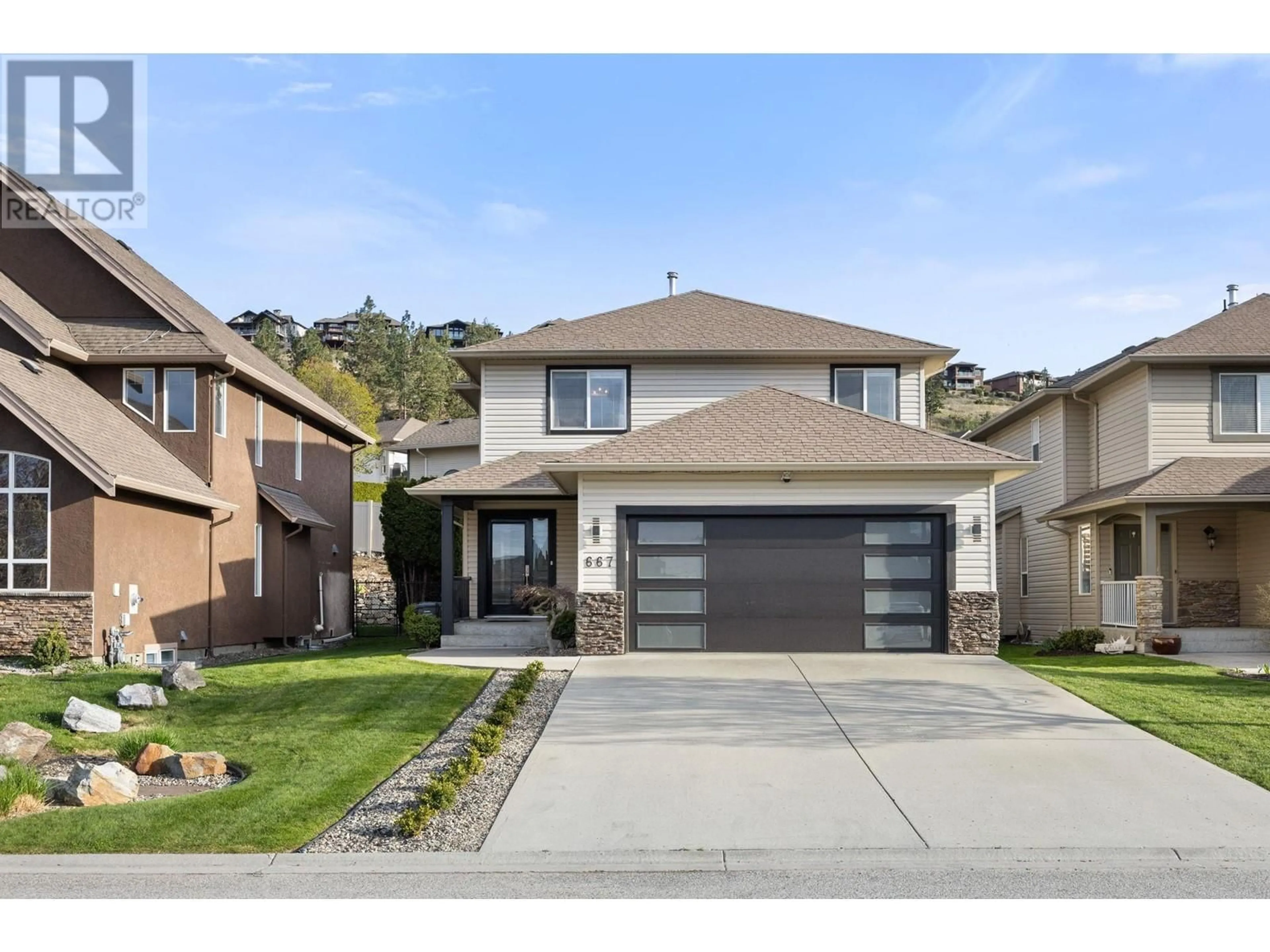 Home with brick exterior material, street for 667 SOUTH CREST DRIVE, Kelowna British Columbia V1W4W6