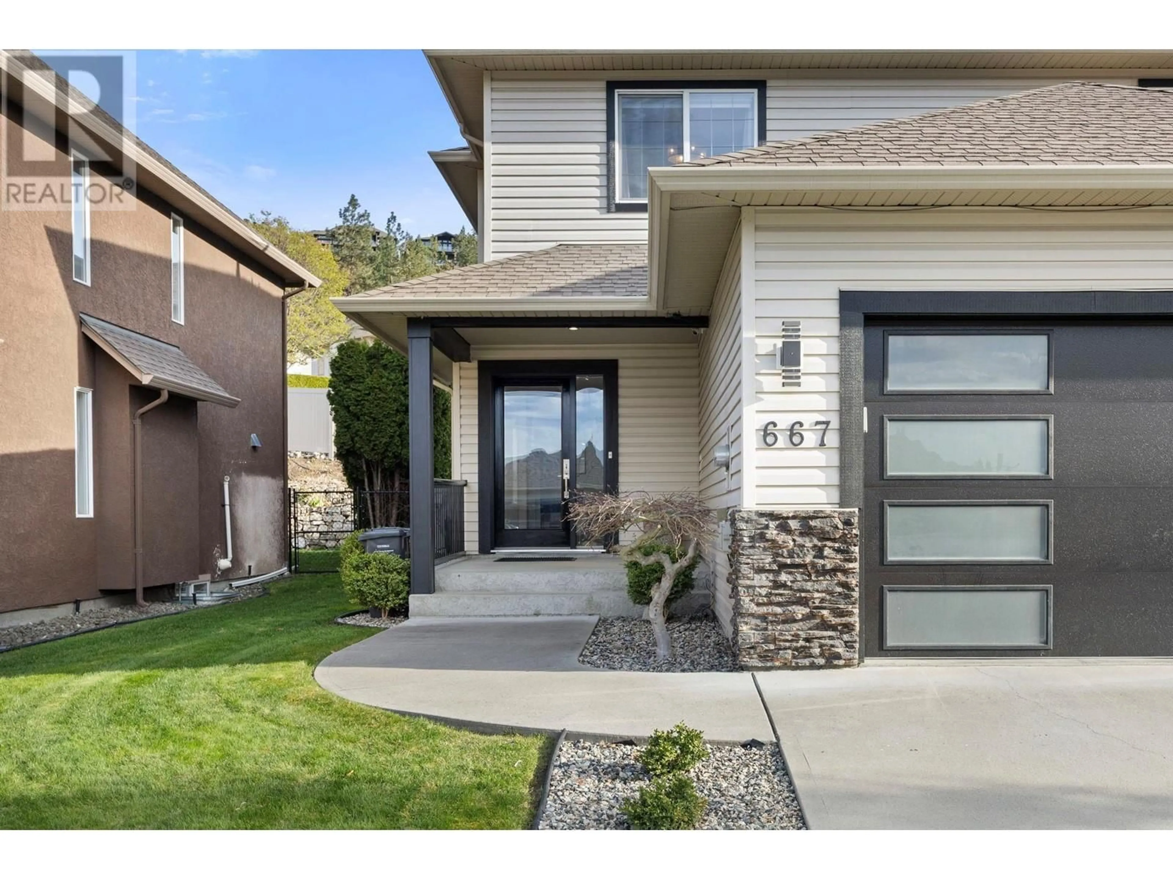 Home with brick exterior material, street for 667 SOUTH CREST DRIVE, Kelowna British Columbia V1W4W6