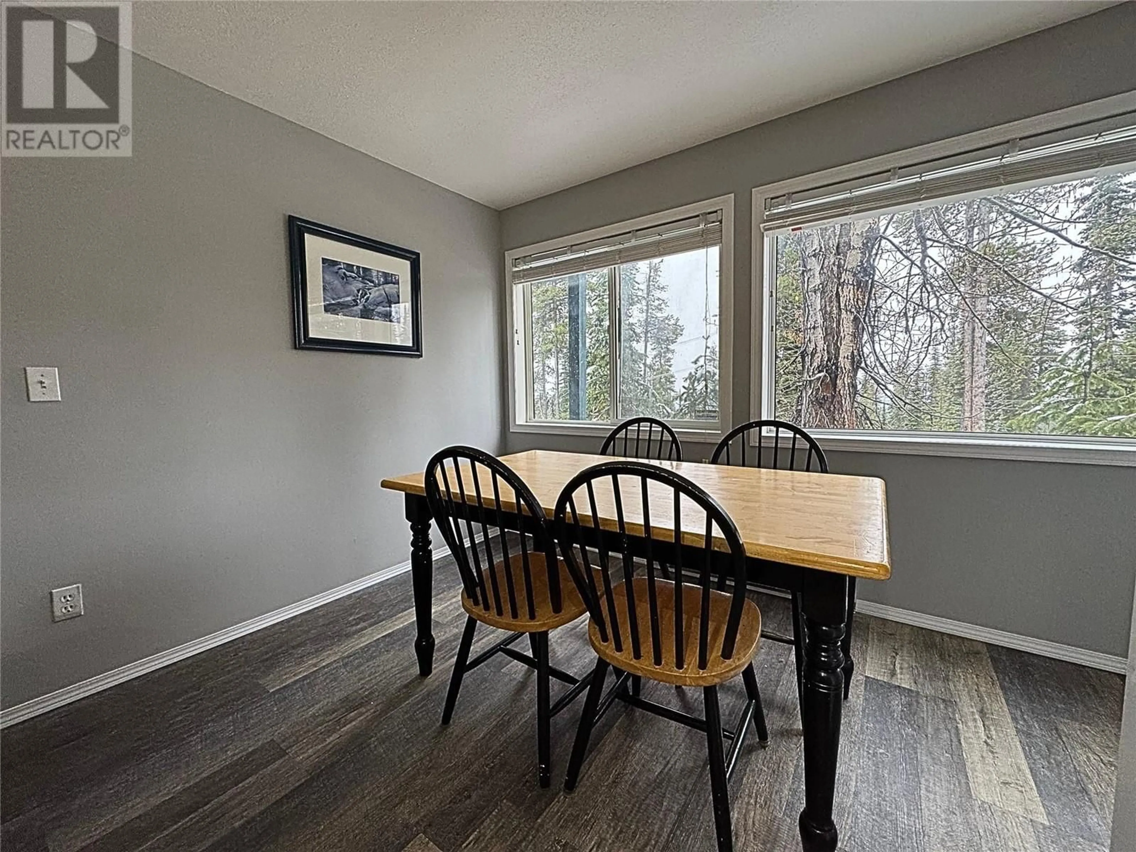 Dining room, wood/laminate floor for C - 4817 SNOWPINES ROAD, Big White British Columbia V1V1P3