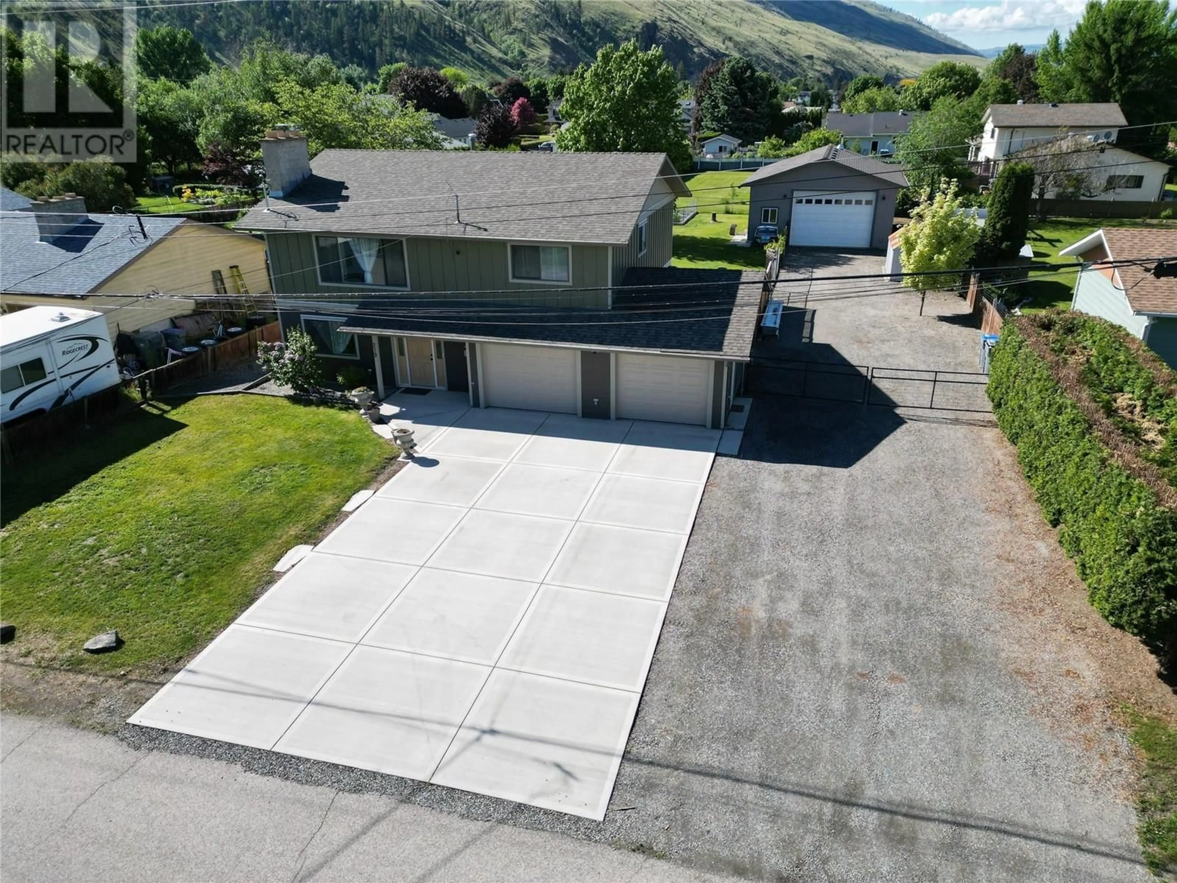 A pic from outside/outdoor area/front of a property/back of a property/a pic from drone, mountain view for 219 MONTEGO ROAD, Kamloops British Columbia V2H1N1