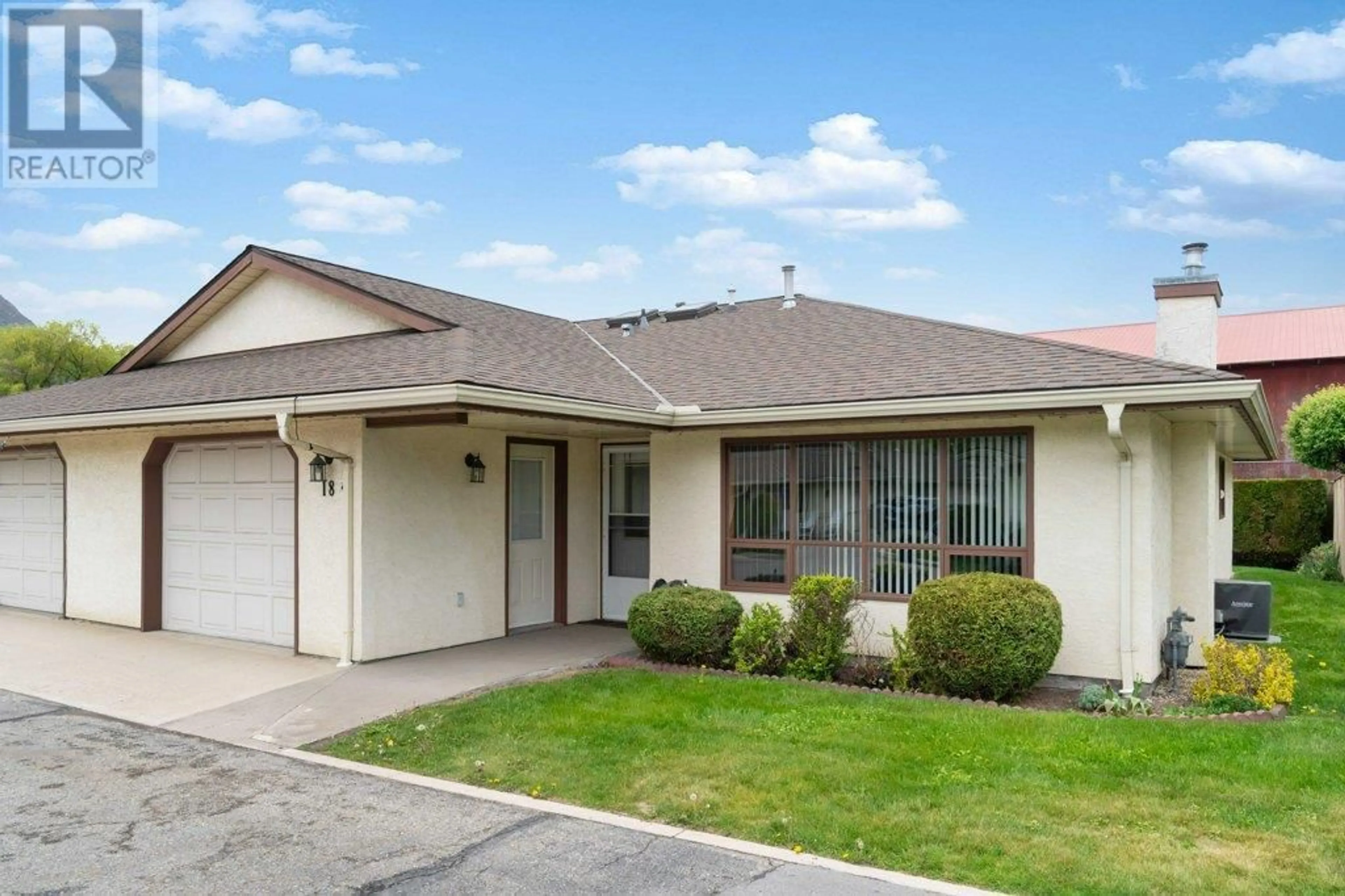 Home with vinyl exterior material, street for 18 - 151 8TH AVENUE SOUTHWEST, Salmon Arm British Columbia V1E1B9