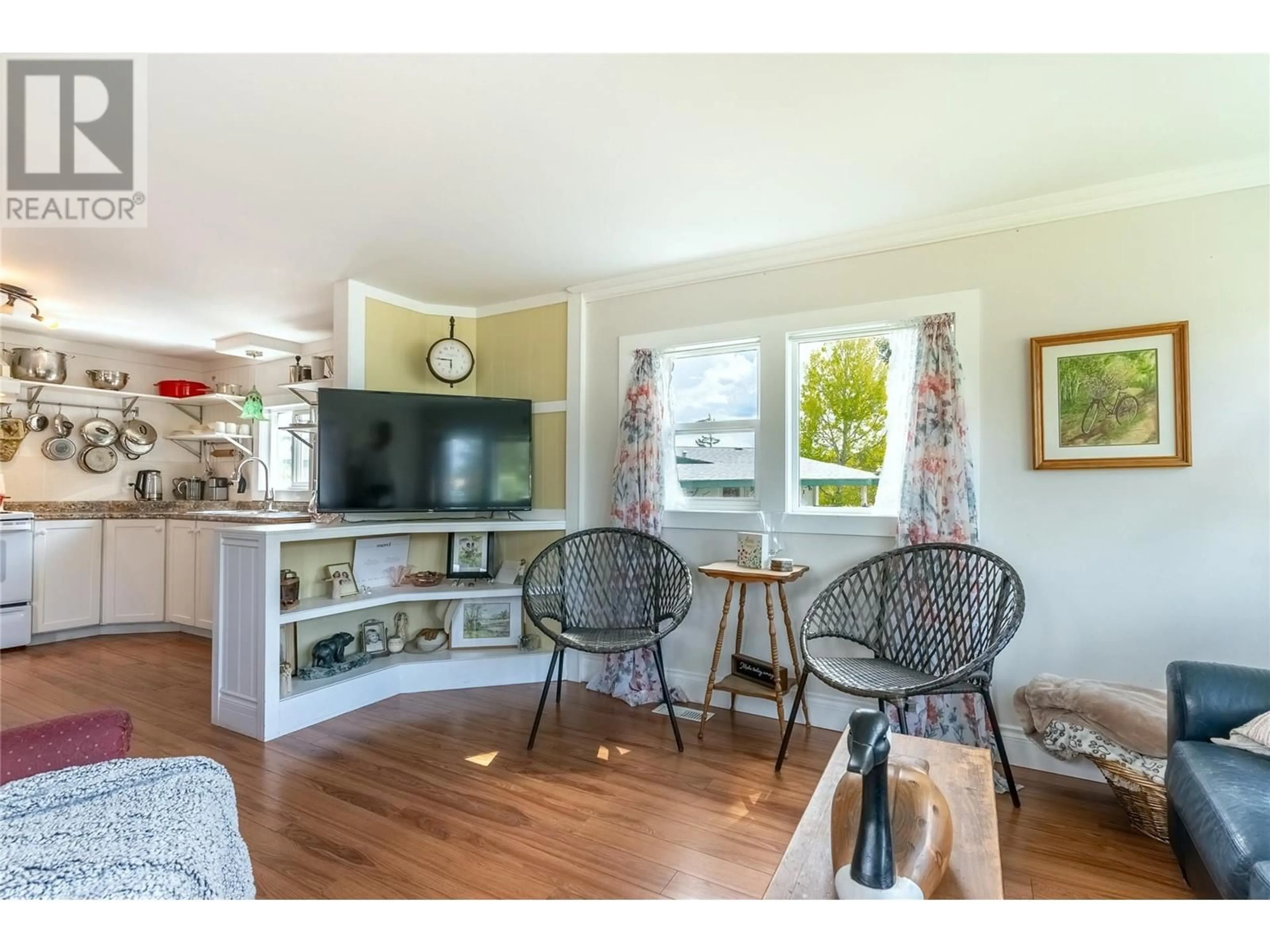 Living room with furniture, wood/laminate floor for 9 JADE COURT, Logan Lake British Columbia V0K1W0