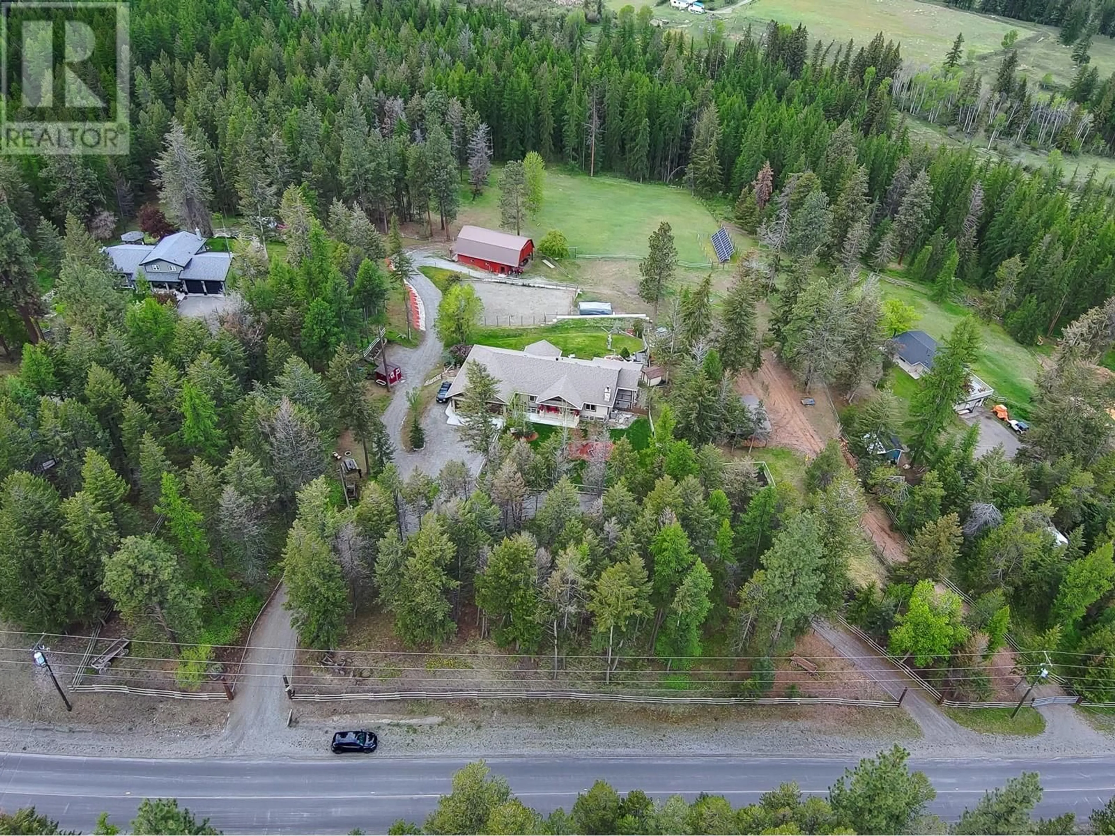 A pic from outside/outdoor area/front of a property/back of a property/a pic from drone, forest/trees view for 3749 SILVER SPRING DRIVE, Cranbrook British Columbia V1C6X8