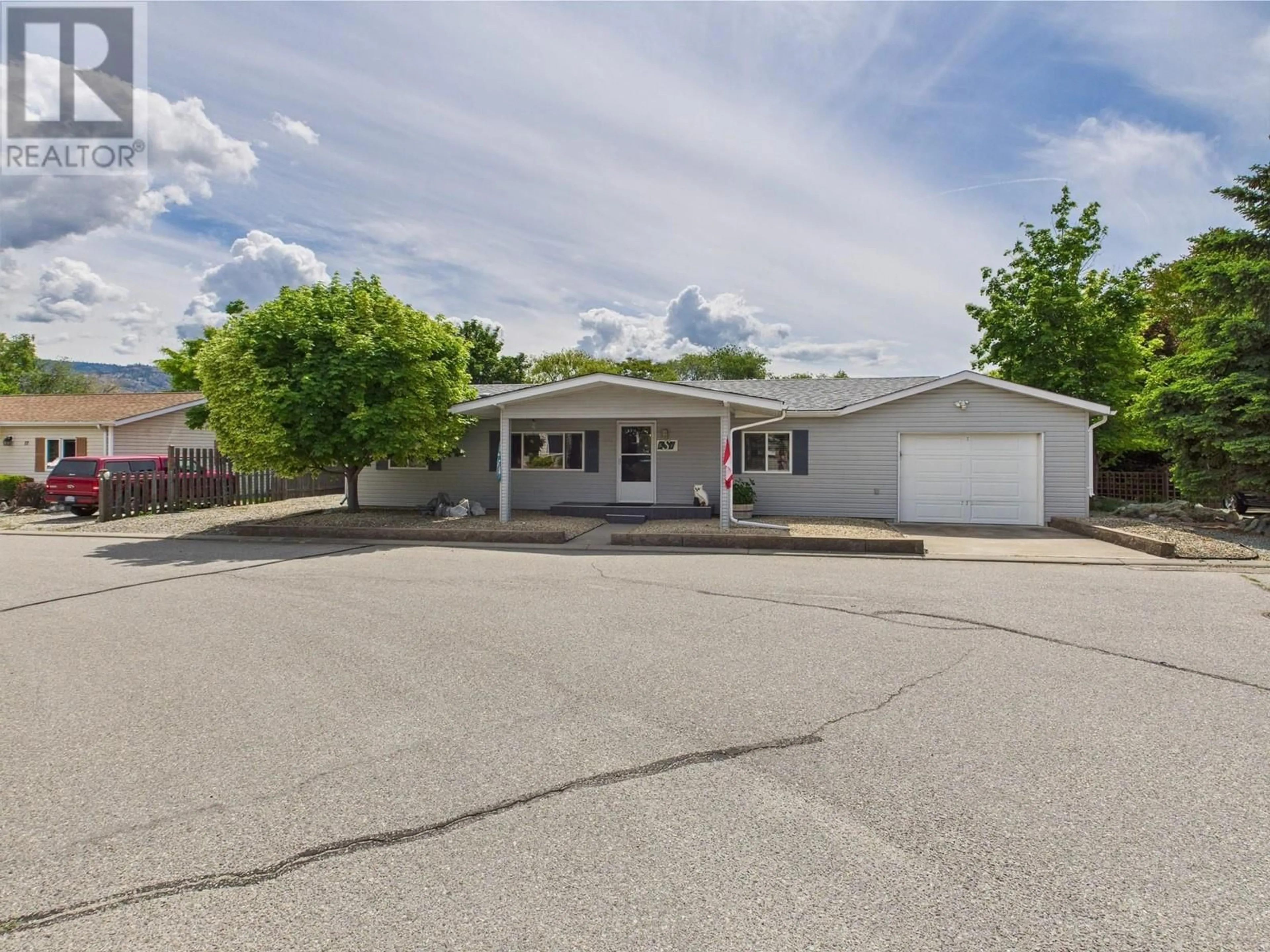 A pic from outside/outdoor area/front of a property/back of a property/a pic from drone, street for 12 - 30 CACTUS CRESCENT, Osoyoos British Columbia V0H1V1