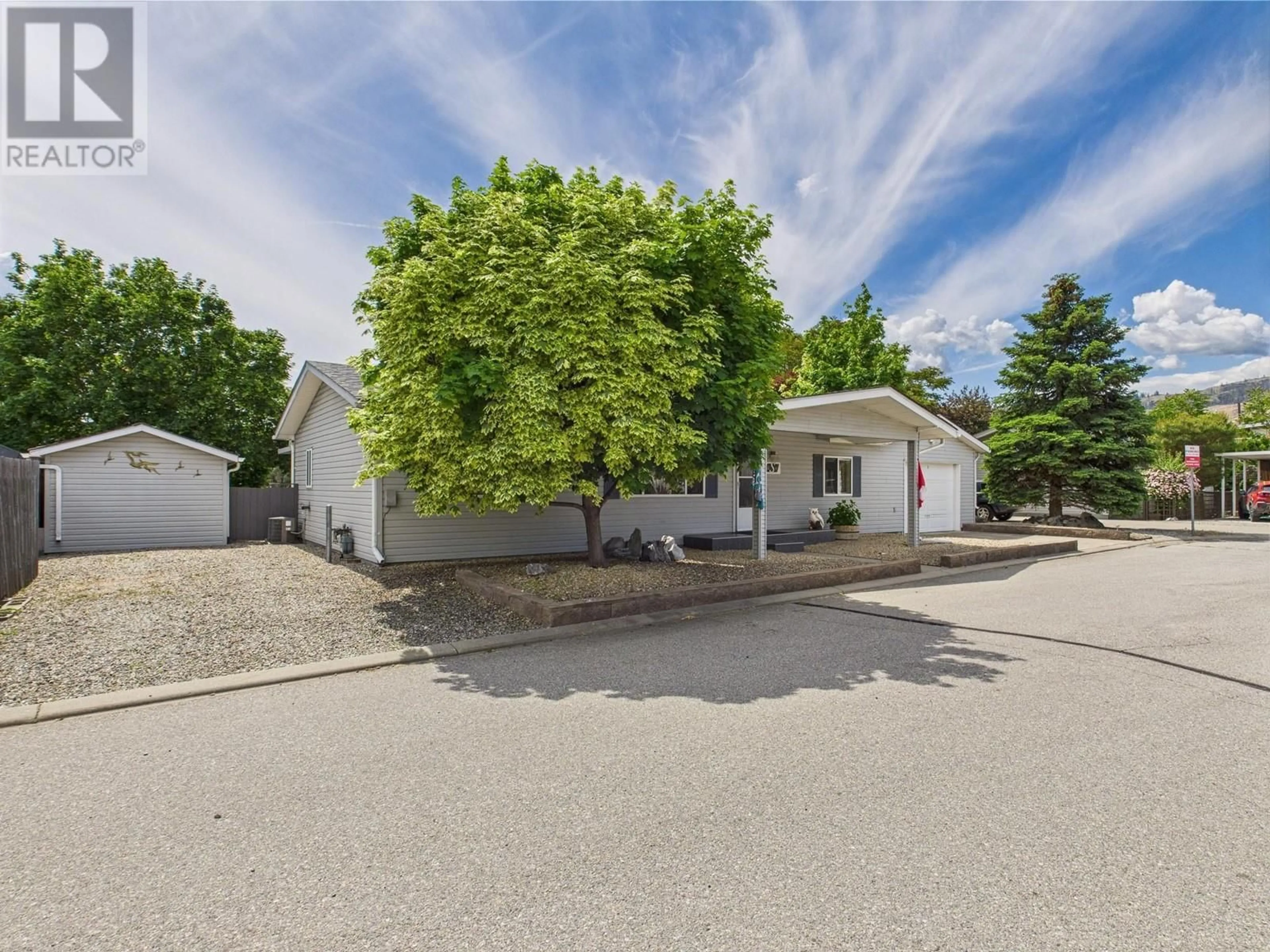 A pic from outside/outdoor area/front of a property/back of a property/a pic from drone, street for 12 - 30 CACTUS CRESCENT, Osoyoos British Columbia V0H1V1