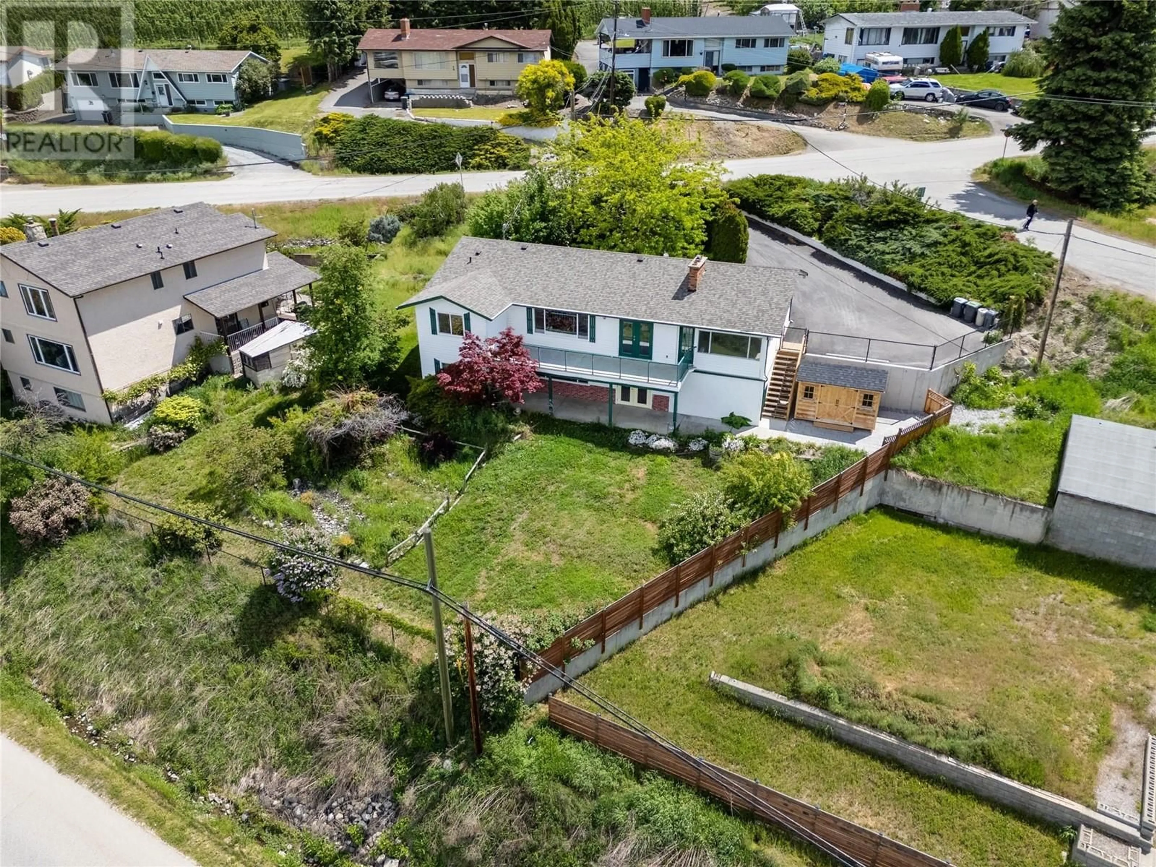 A pic from outside/outdoor area/front of a property/back of a property/a pic from drone, street for 849 MCKENZIE ROAD, Kelowna British Columbia V1X2B4
