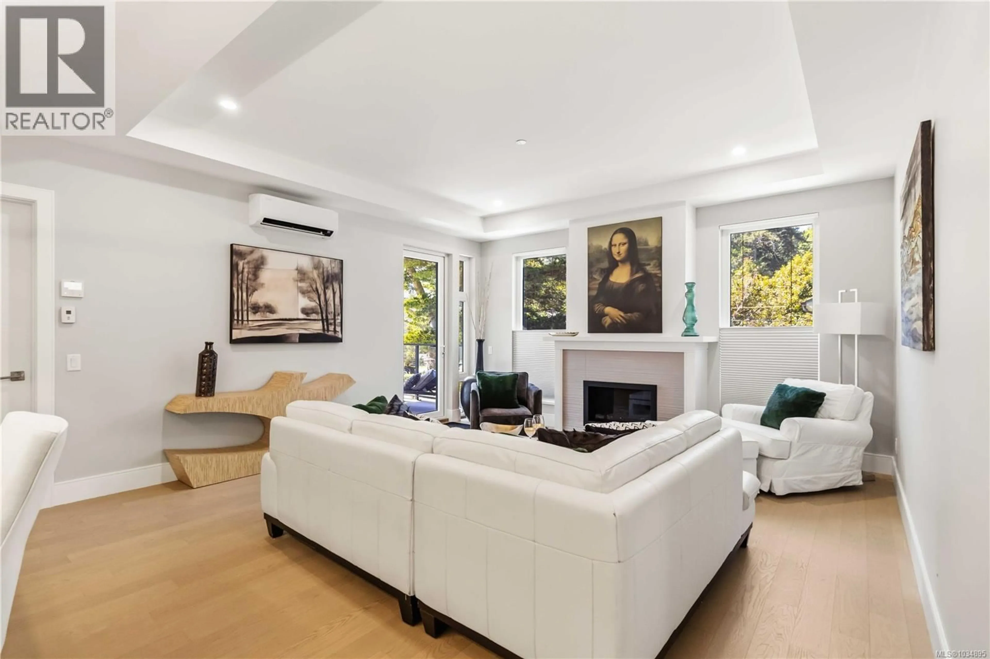 Living room with furniture, unknown for 201 - 990 DOUMAC AVENUE, Saanich British Columbia V8Y1M4