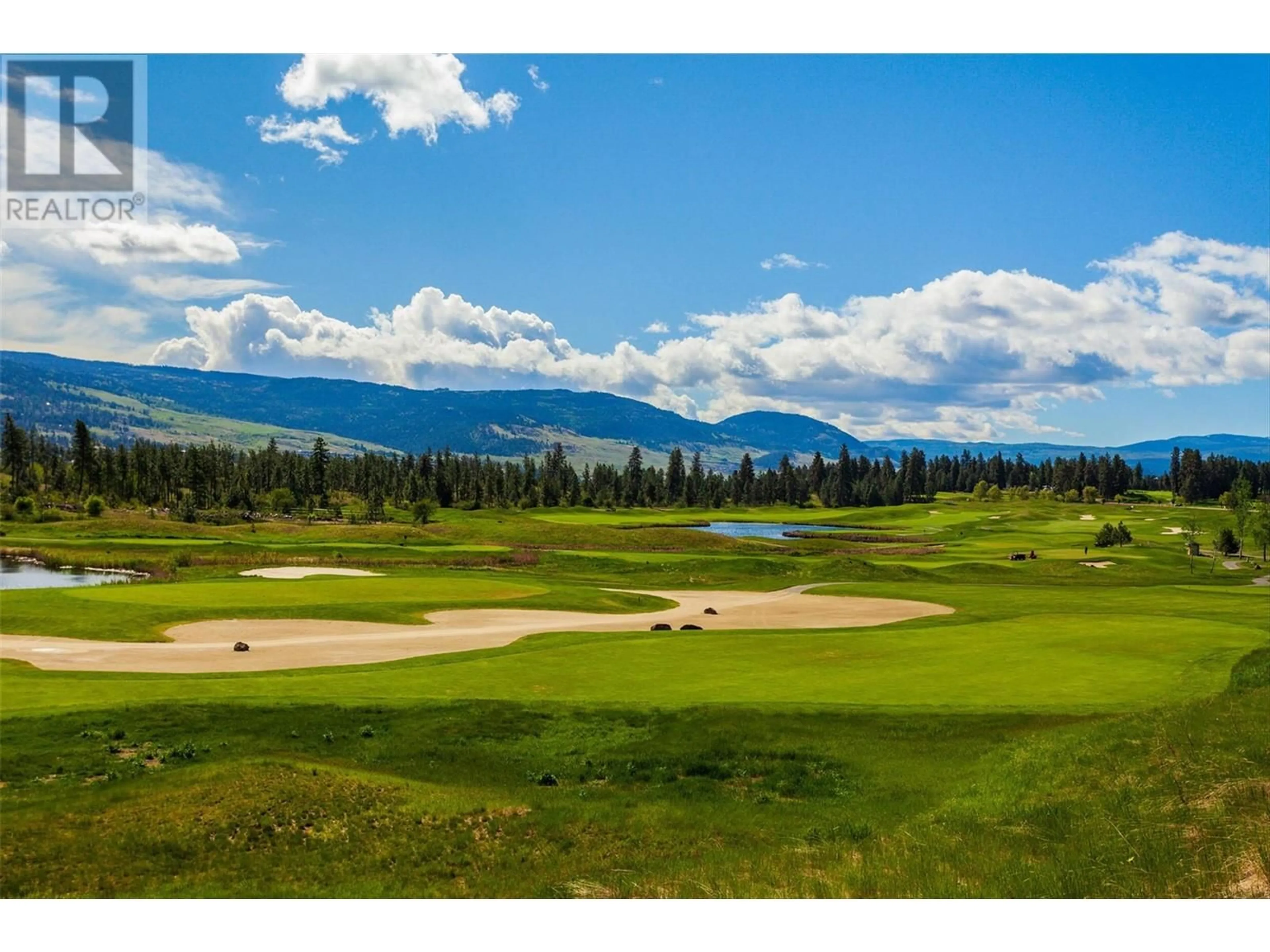 A pic from outside/outdoor area/front of a property/back of a property/a pic from drone, mountain view for 1105 - 1875 COUNTRY CLUB DRIVE, Kelowna British Columbia V1V2W0