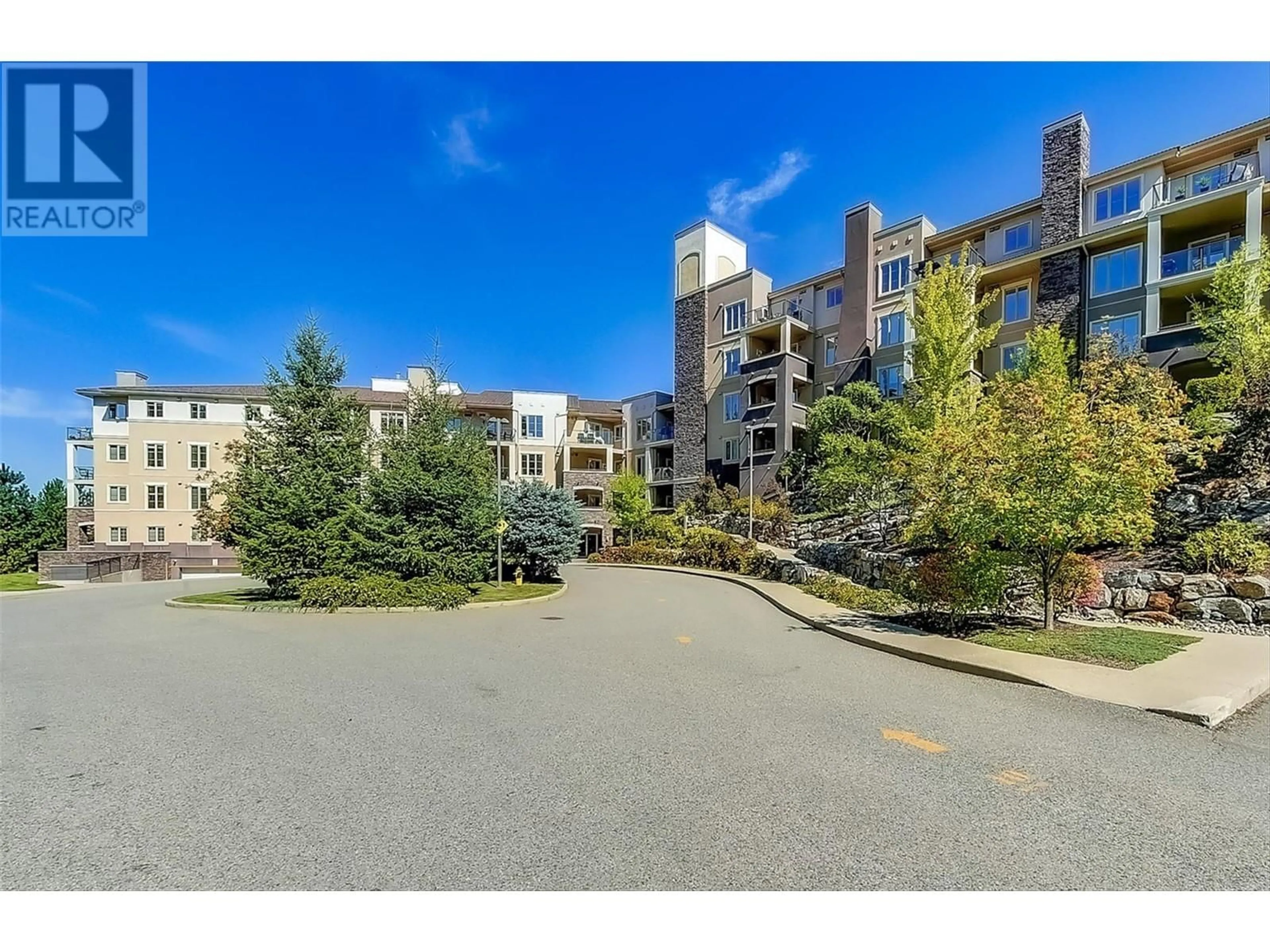 A pic from outside/outdoor area/front of a property/back of a property/a pic from drone, mountain view for 1105 - 1875 COUNTRY CLUB DRIVE, Kelowna British Columbia V1V2W0