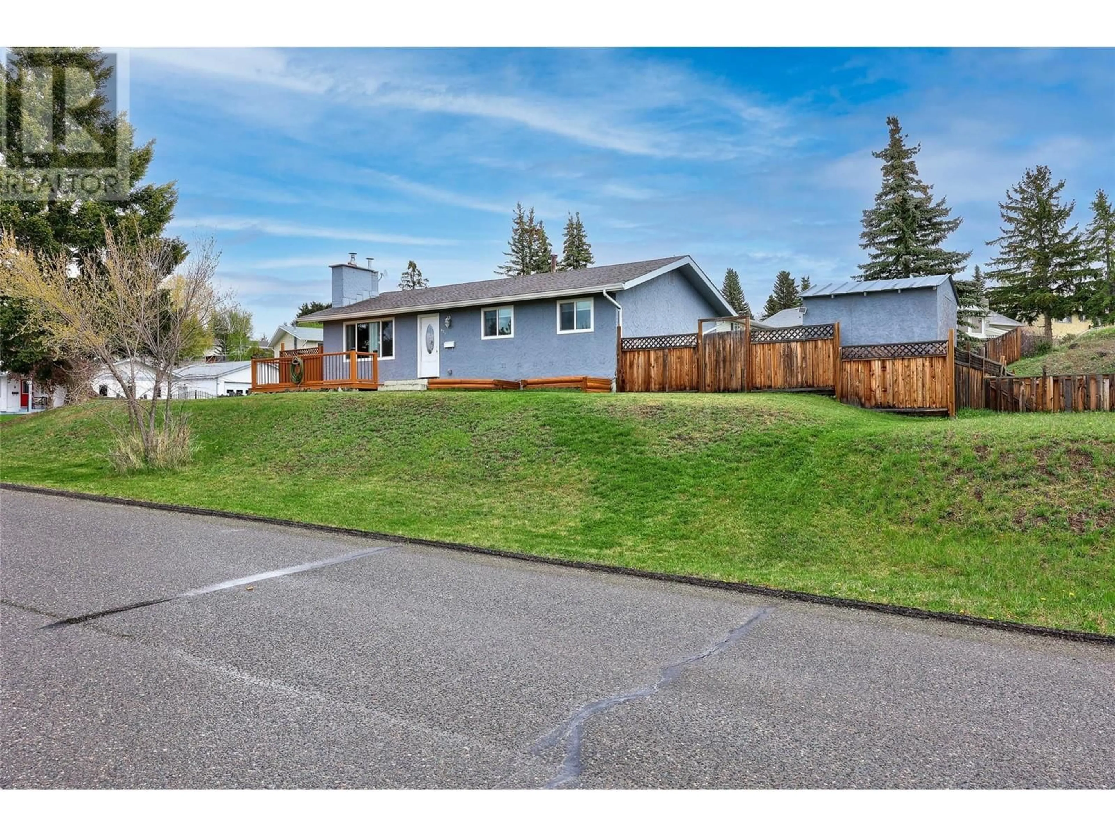 Home with vinyl exterior material, street for 423 OPAL DRIVE, Logan Lake British Columbia V0K1W0