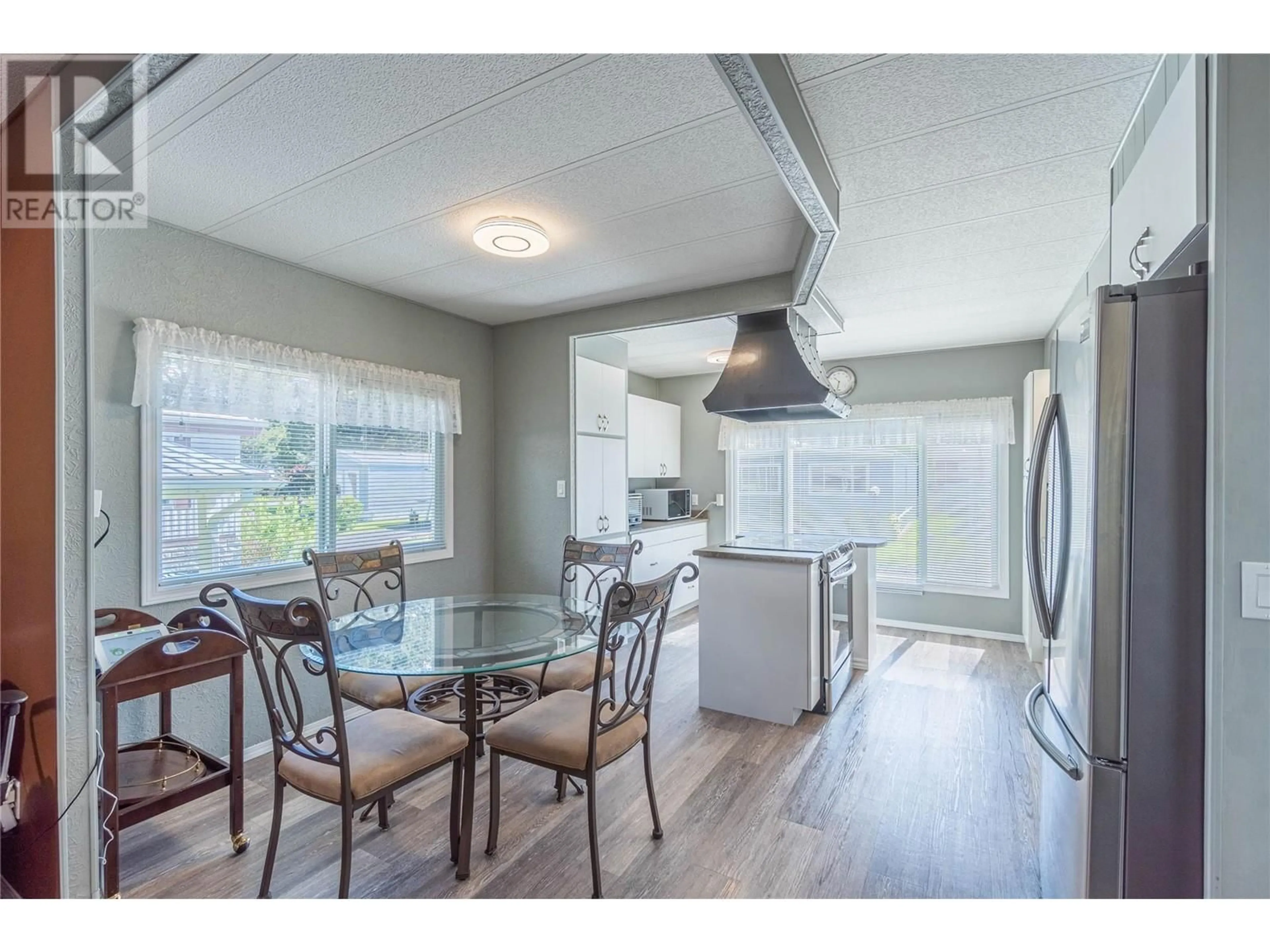 Open concept kitchen, wood/laminate floor for 27 - 2400 OAKDALE WAY, Kamloops British Columbia V2B6W7