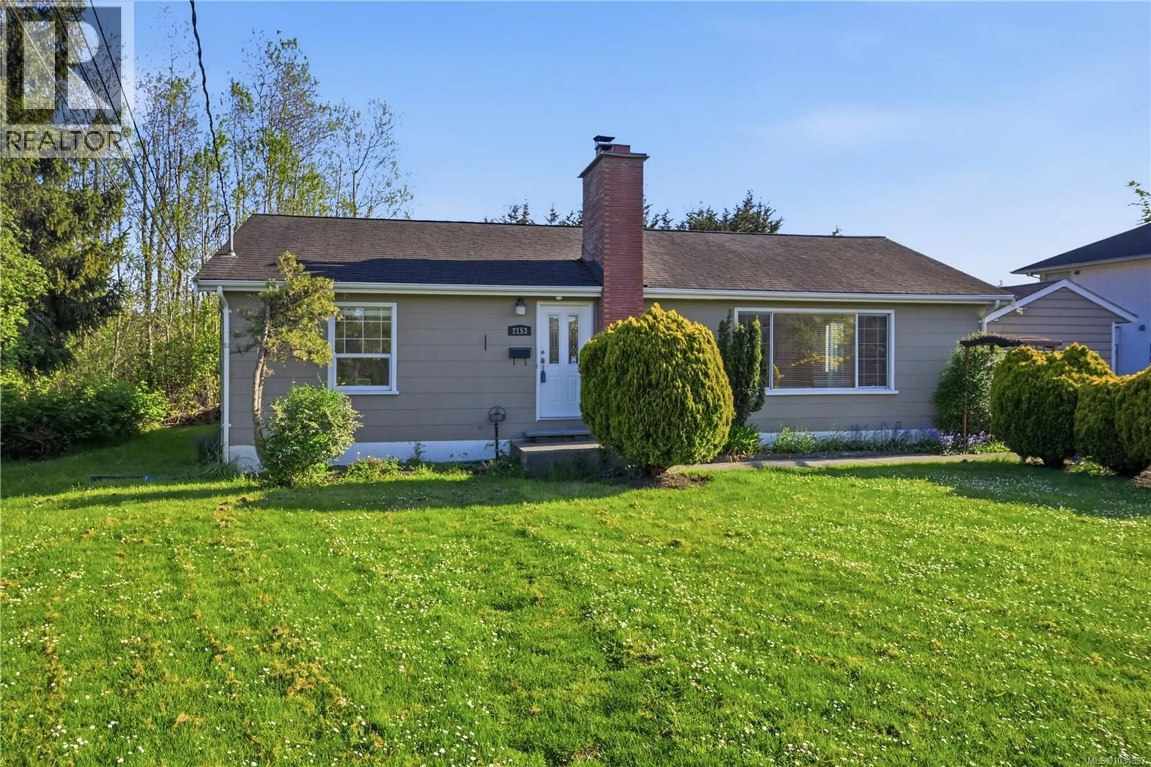 Home with vinyl exterior material, street for 2153 JAMES WHITE BOULEVARD, Sidney British Columbia V8L1Y9