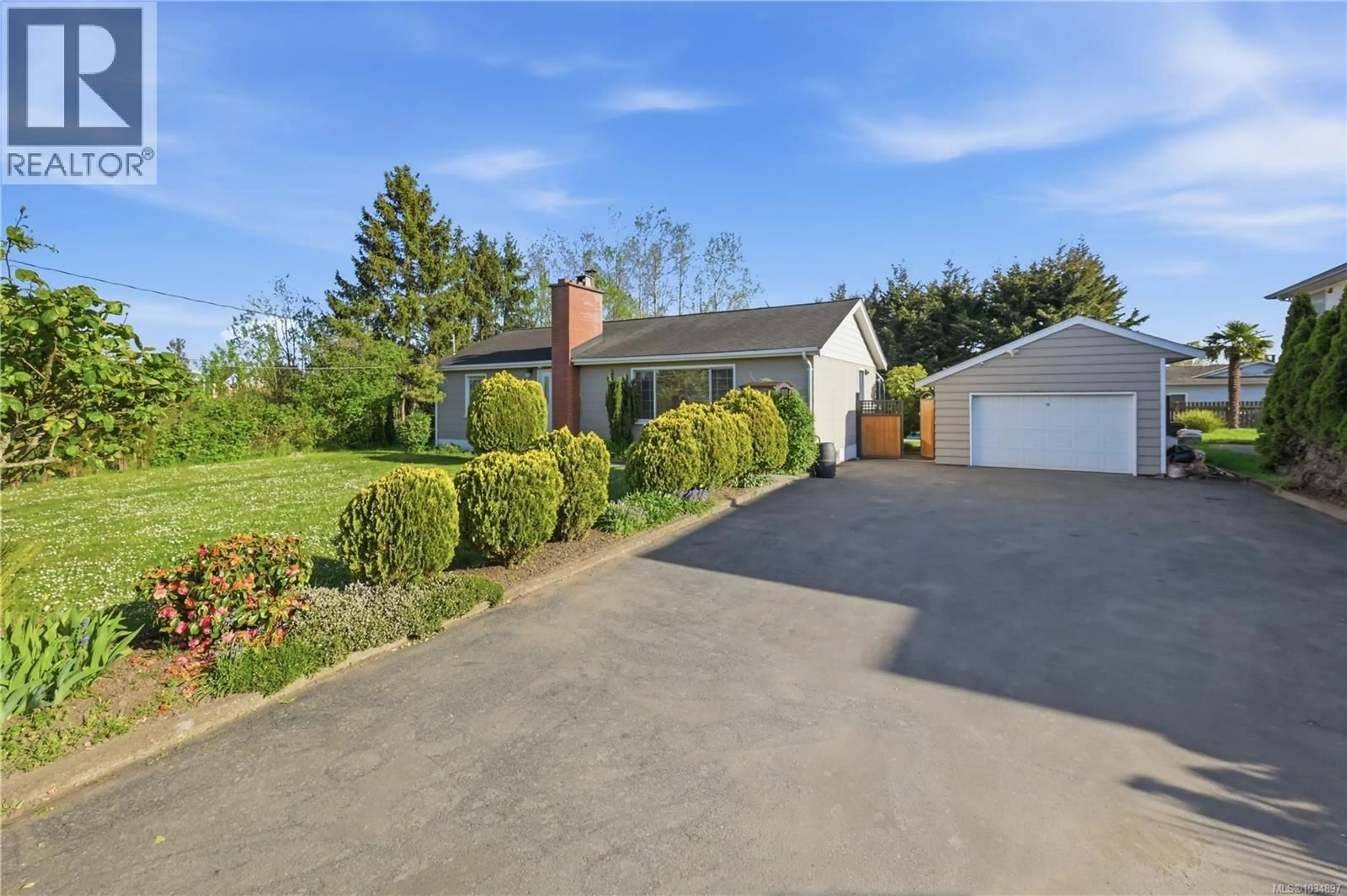 A pic from outside/outdoor area/front of a property/back of a property/a pic from drone, street for 2153 JAMES WHITE BOULEVARD, Sidney British Columbia V8L1Y9