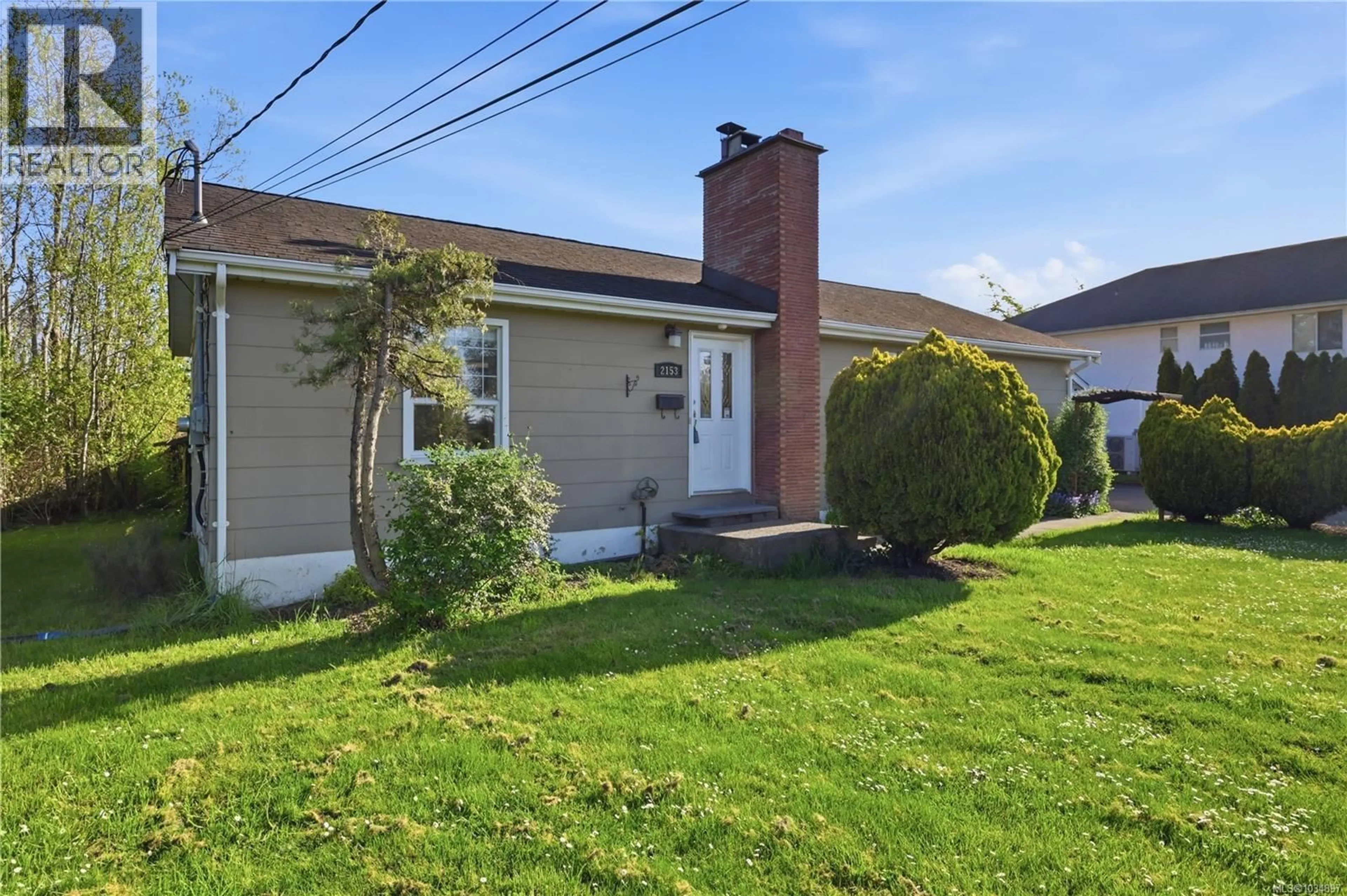 Home with vinyl exterior material, street for 2153 JAMES WHITE BOULEVARD, Sidney British Columbia V8L1Y9