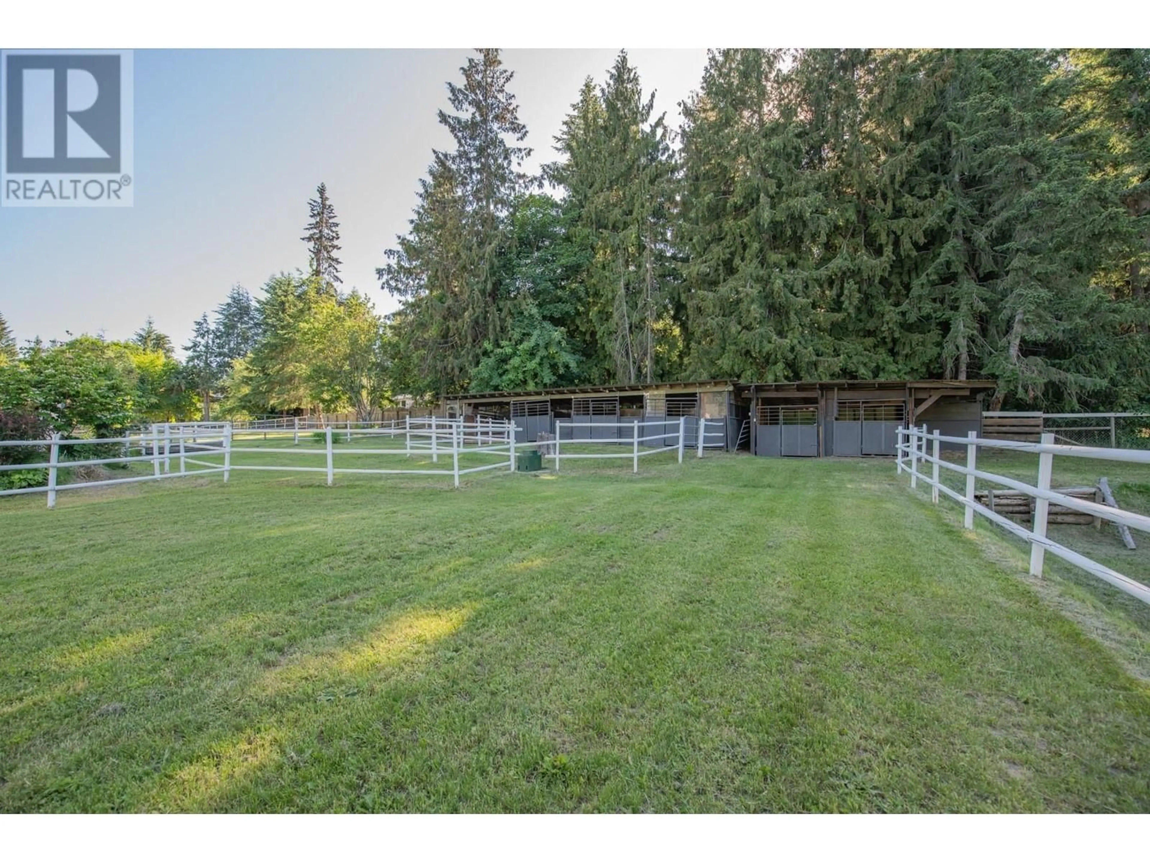 A pic from outside/outdoor area/front of a property/back of a property/a pic from drone, forest/trees view for 4091 10 AVENUE SOUTHEAST, Salmon Arm British Columbia V1E1W7
