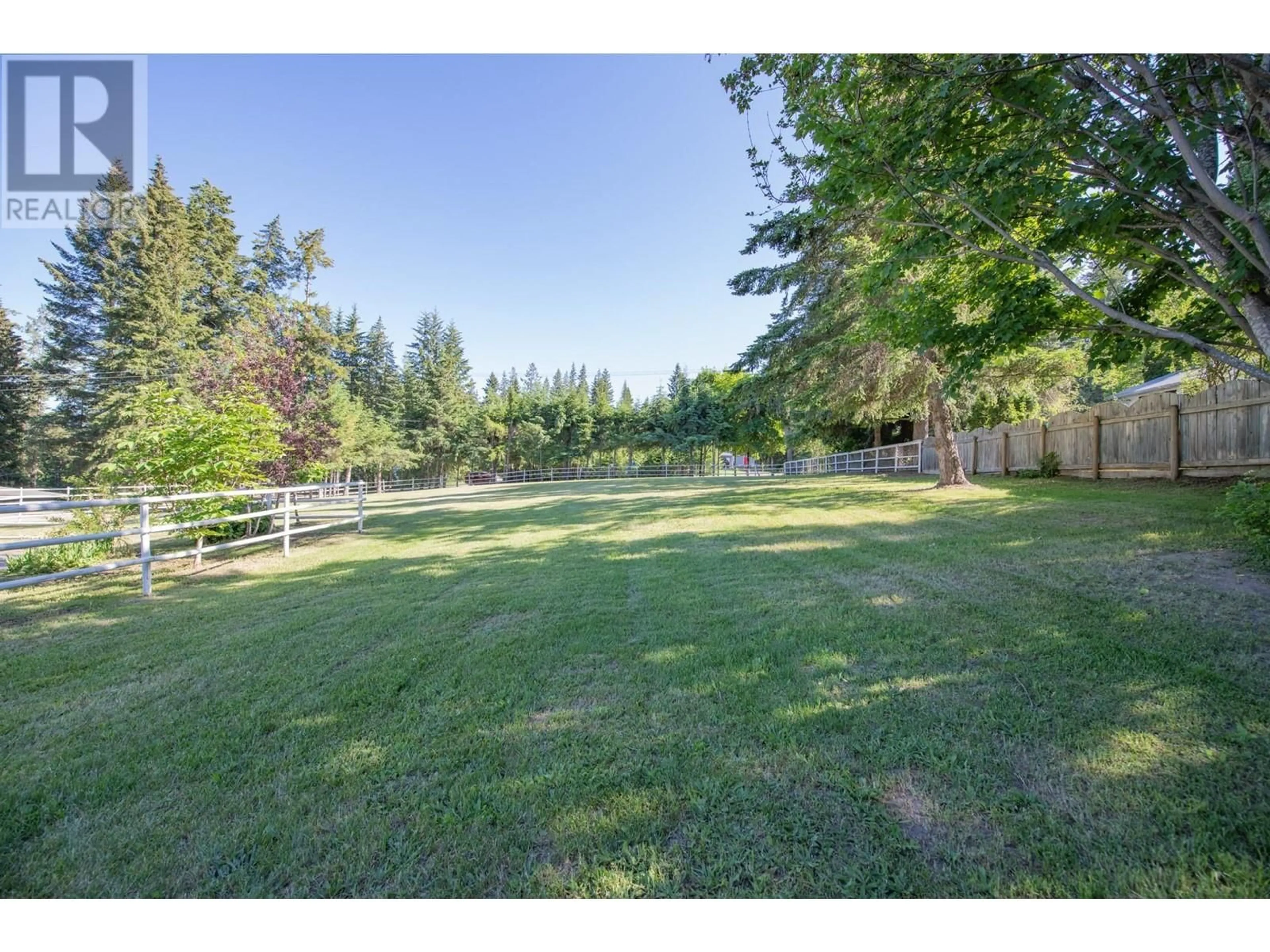 A pic from outside/outdoor area/front of a property/back of a property/a pic from drone, water/lake/river/ocean view for 4091 10 AVENUE SOUTHEAST, Salmon Arm British Columbia V1E1W7