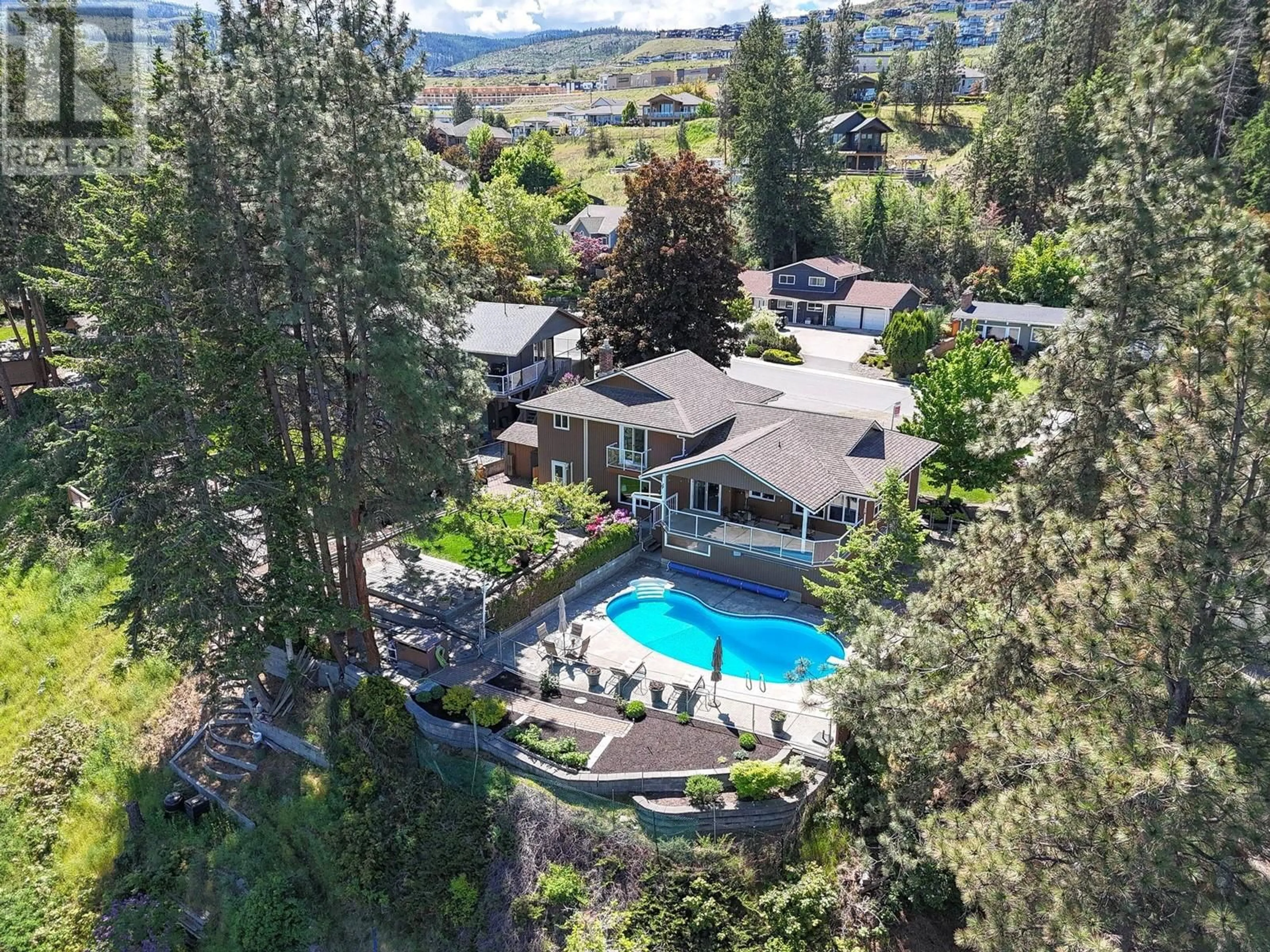 A pic from outside/outdoor area/front of a property/back of a property/a pic from drone, mountain view for 834 STEELE ROAD, Kelowna British Columbia V1W4P1