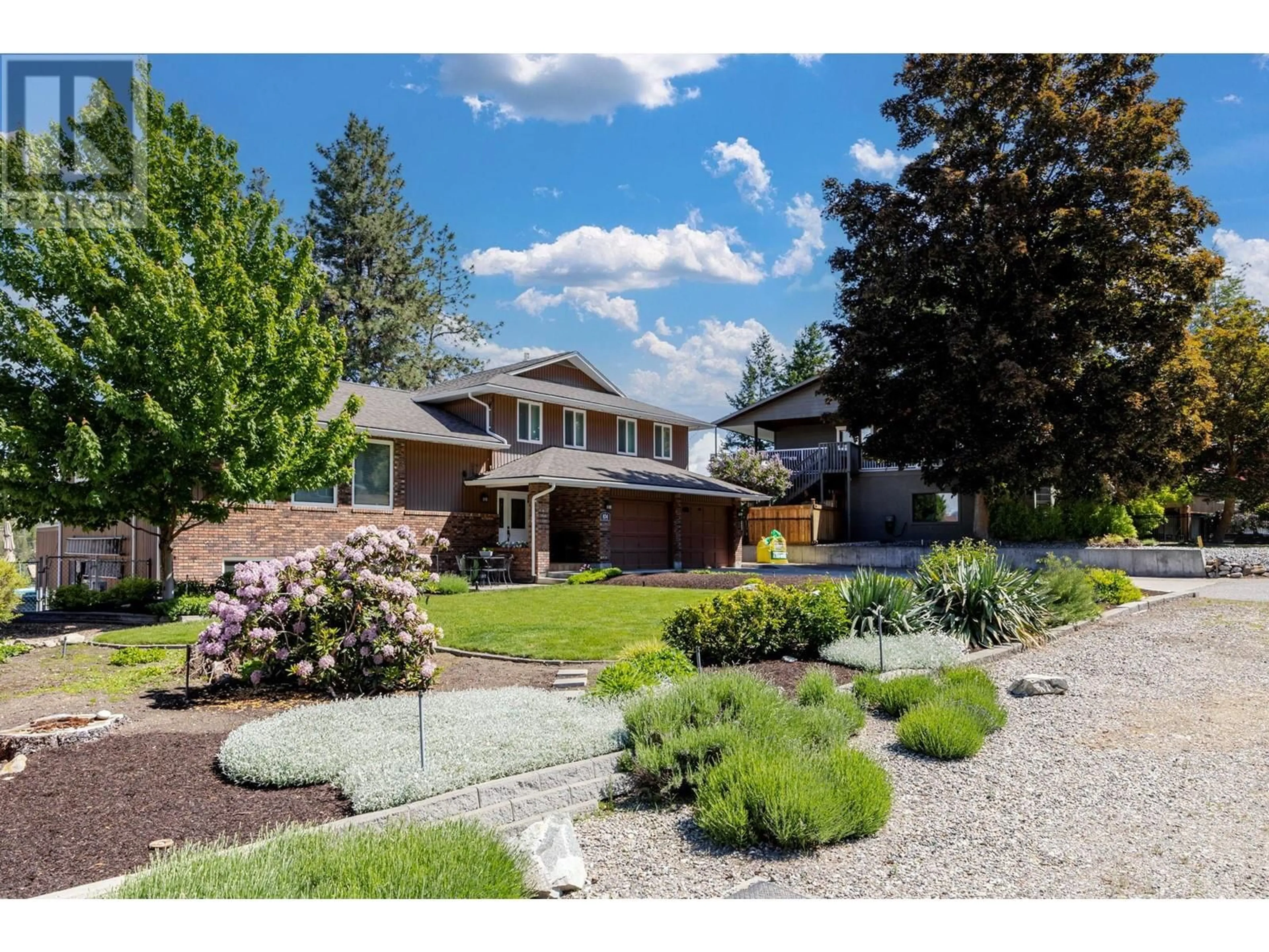 A pic from outside/outdoor area/front of a property/back of a property/a pic from drone, street for 834 STEELE ROAD, Kelowna British Columbia V1W4P1