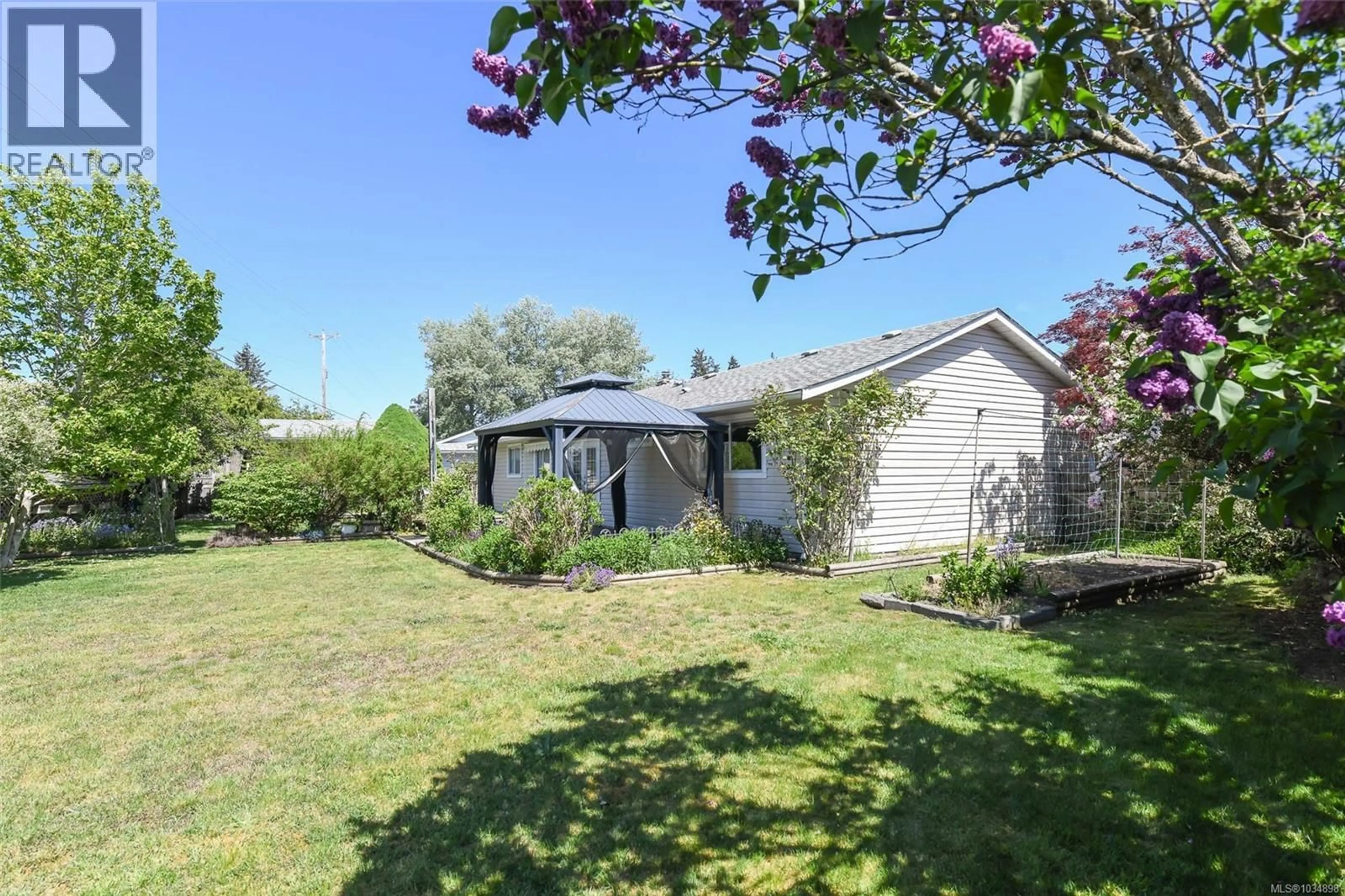 A pic from outside/outdoor area/front of a property/back of a property/a pic from drone, street for 1935 MERINO PLACE, Comox British Columbia V9M3X7