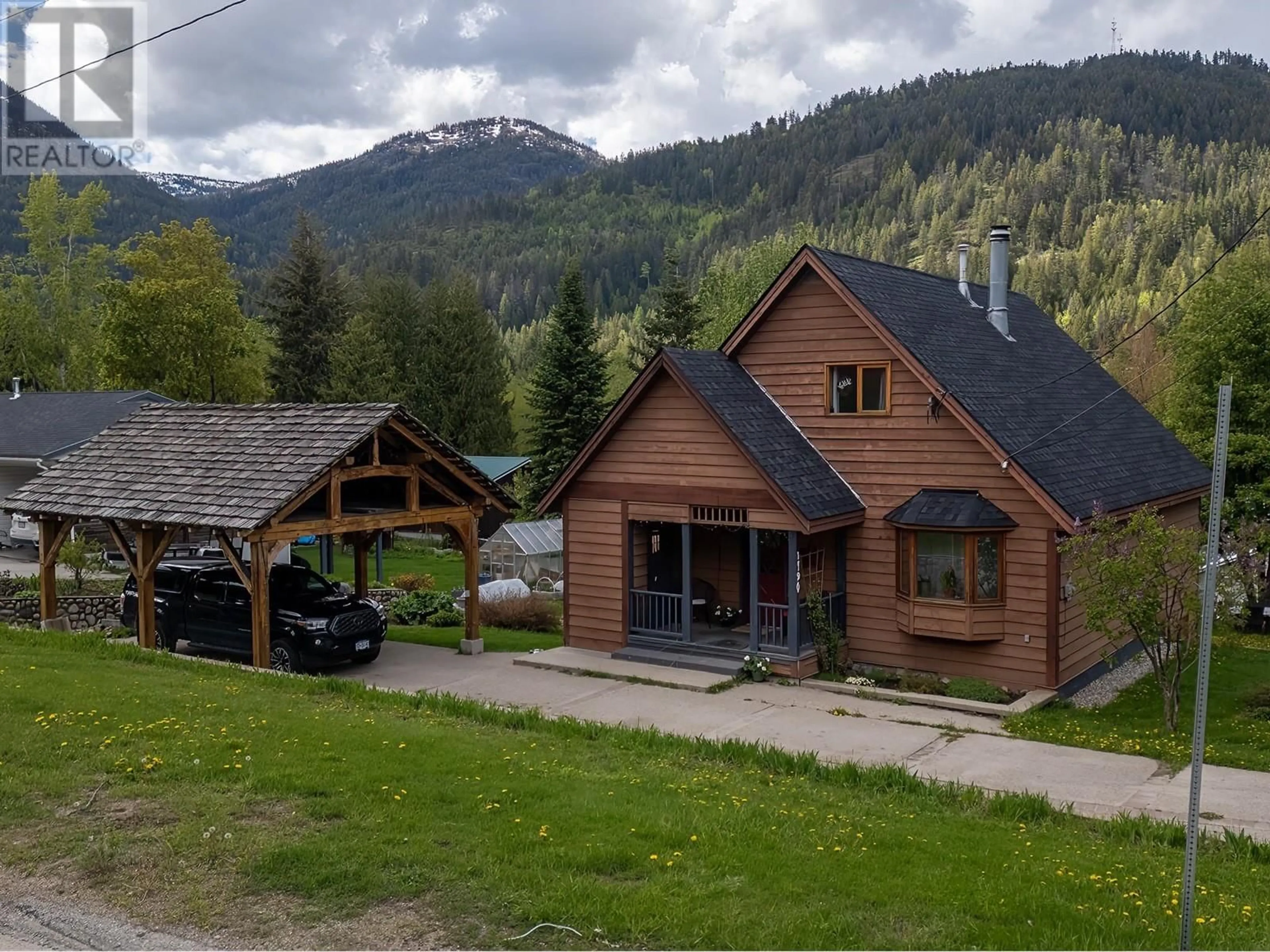 A pic from outside/outdoor area/front of a property/back of a property/a pic from drone, mountain view for 1190 BLACK BEAR DRIVE, Rossland British Columbia V0G1Y0
