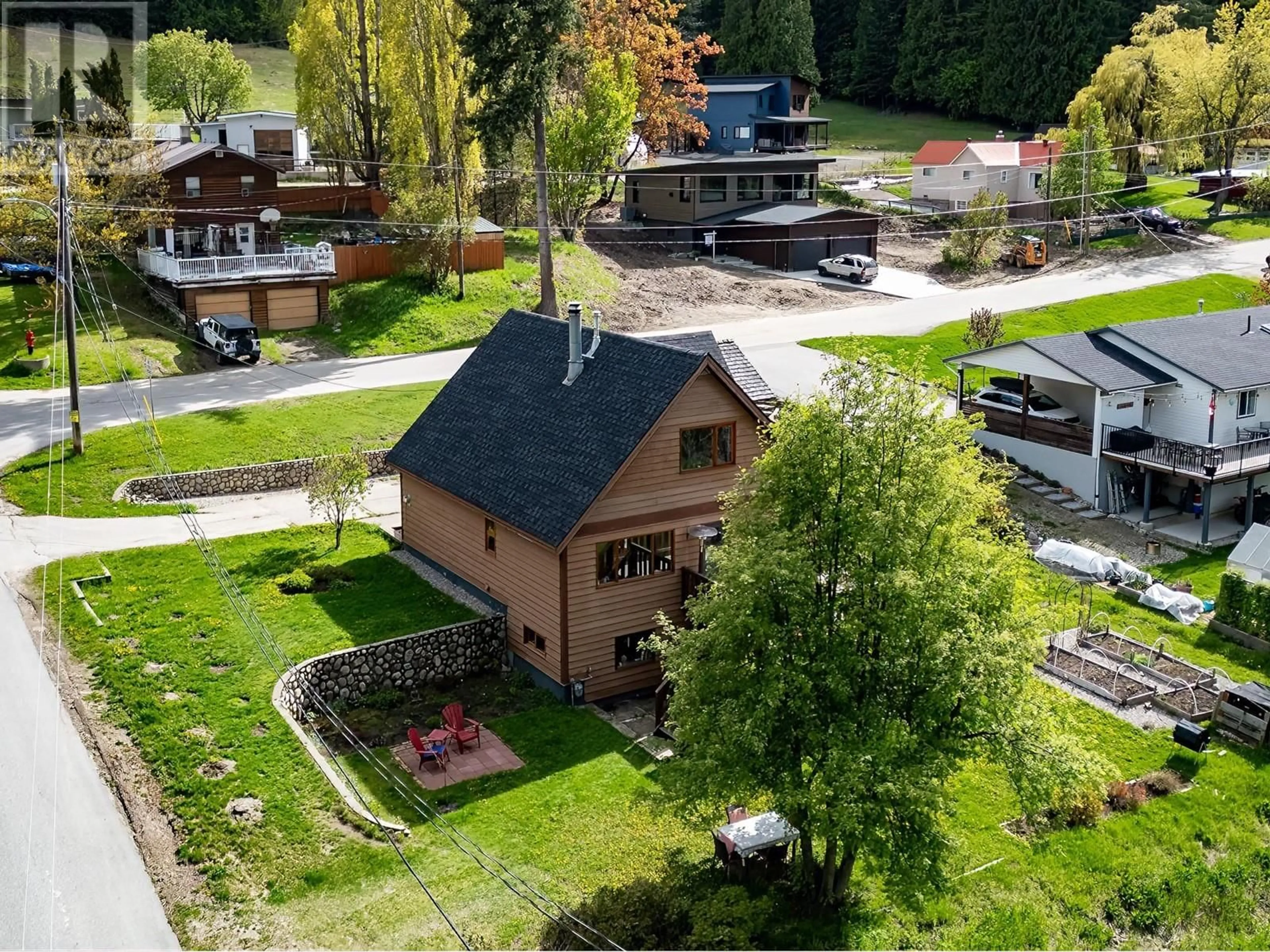 A pic from outside/outdoor area/front of a property/back of a property/a pic from drone, mountain view for 1190 BLACK BEAR DRIVE, Rossland British Columbia V0G1Y0