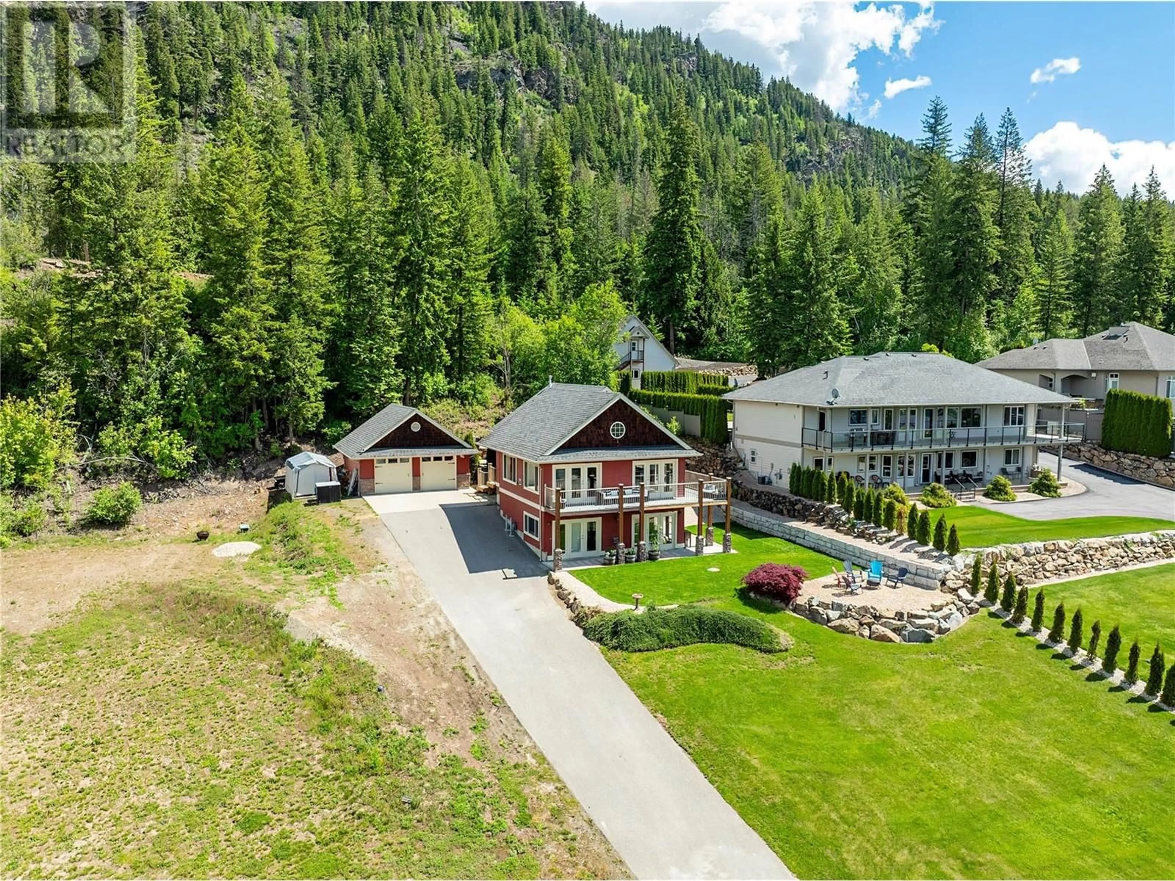 A pic from outside/outdoor area/front of a property/back of a property/a pic from drone, mountain view for 3240 RONCASTLE ROAD, Blind Bay British Columbia V0E1H1