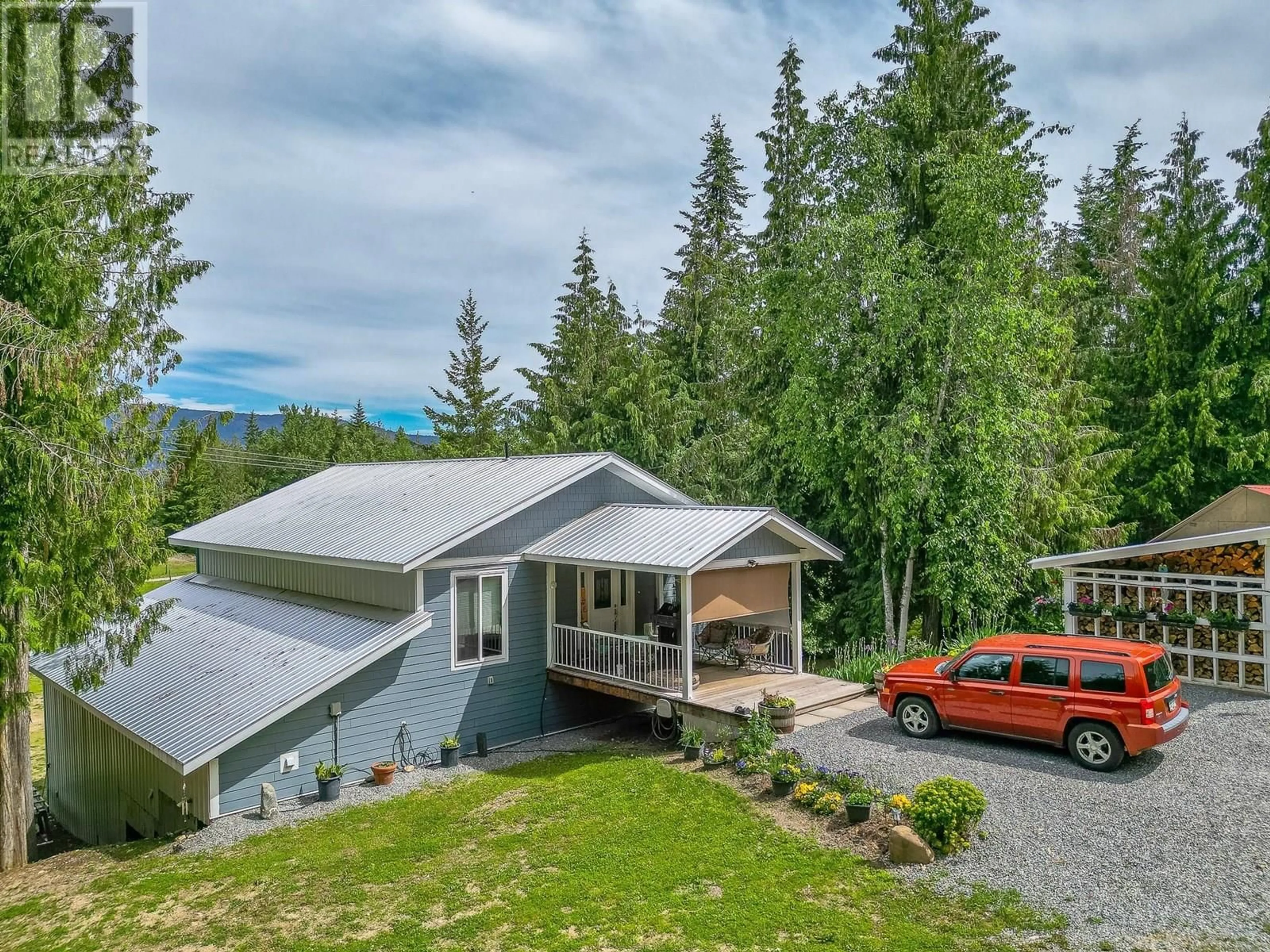 A pic from outside/outdoor area/front of a property/back of a property/a pic from drone, mountain view for 645 CAPRI ROAD, Enderby British Columbia V0E1V3