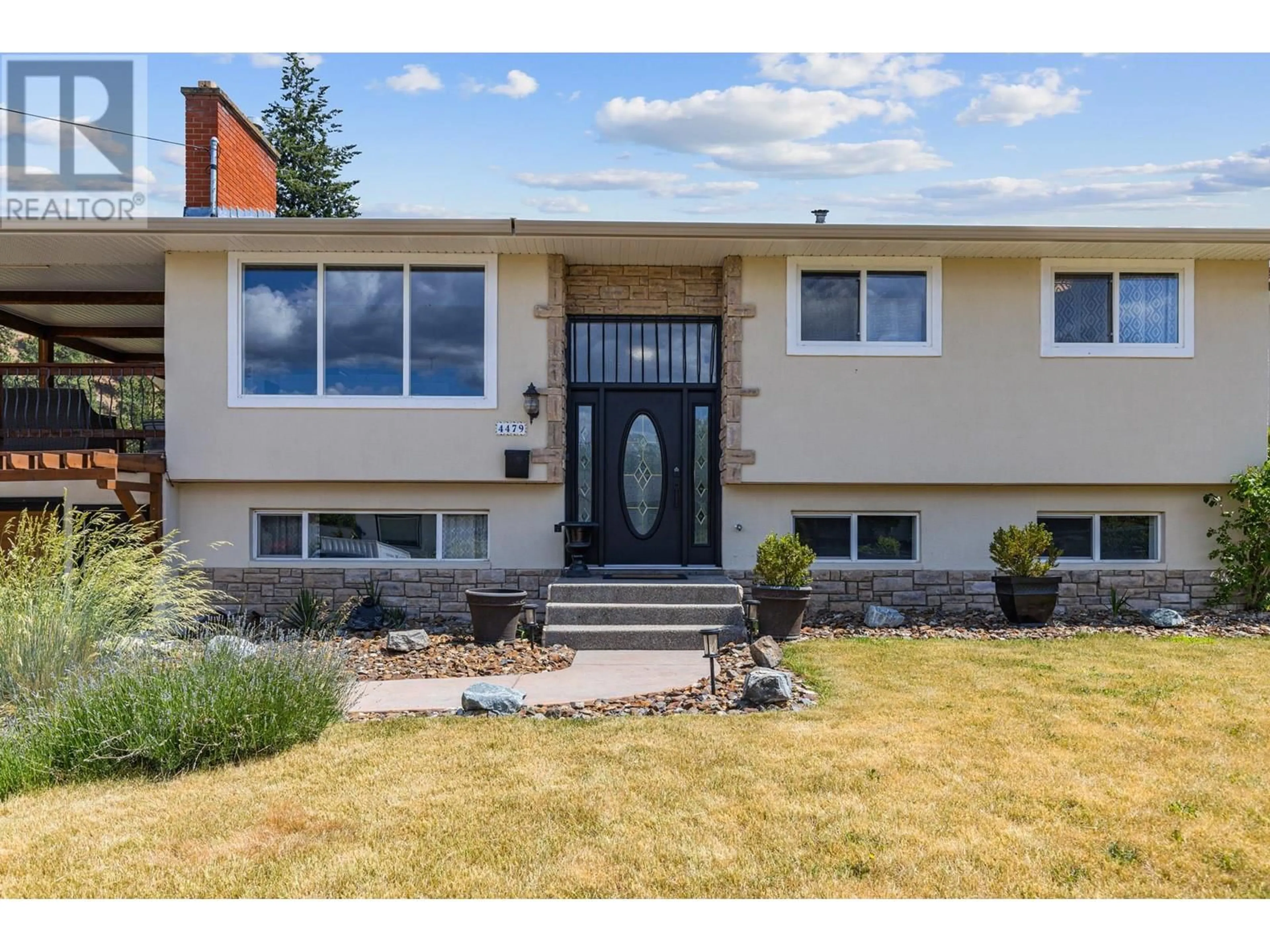 Home with vinyl exterior material, street for 4479 WASILOW ROAD, Kelowna British Columbia V1W1R7