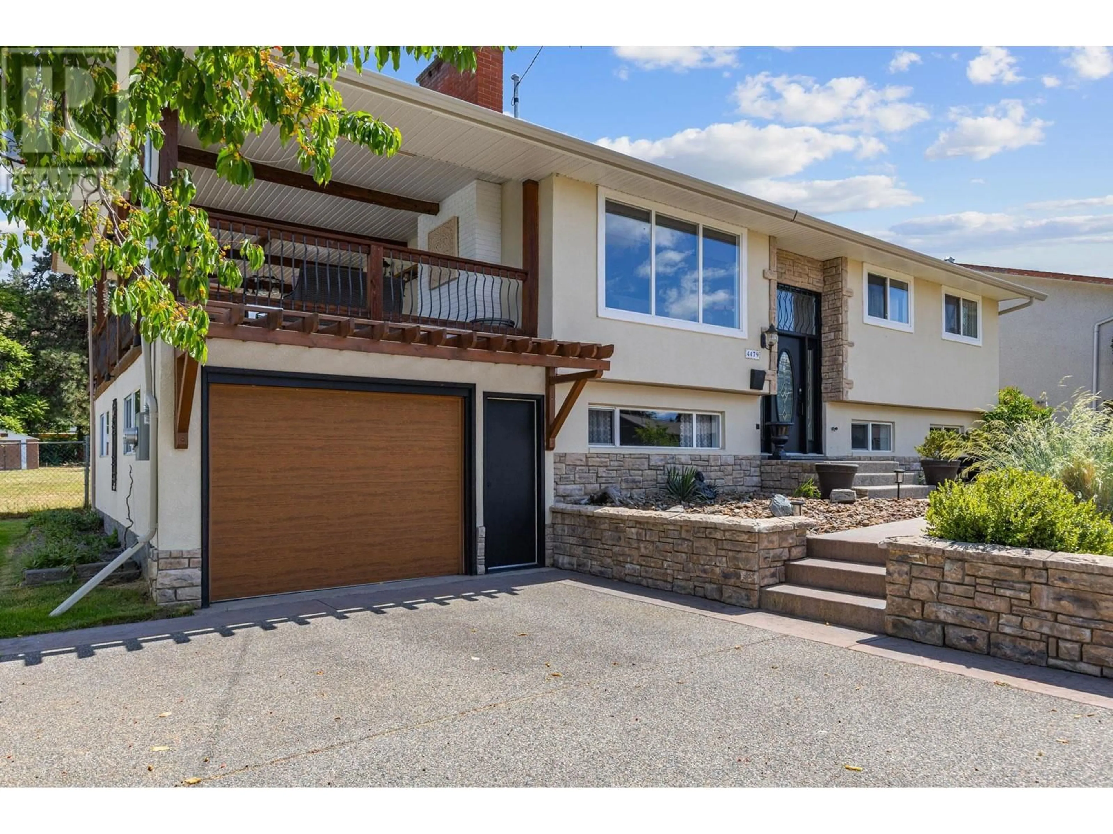 Home with brick exterior material, street for 4479 WASILOW ROAD, Kelowna British Columbia V1W1R7