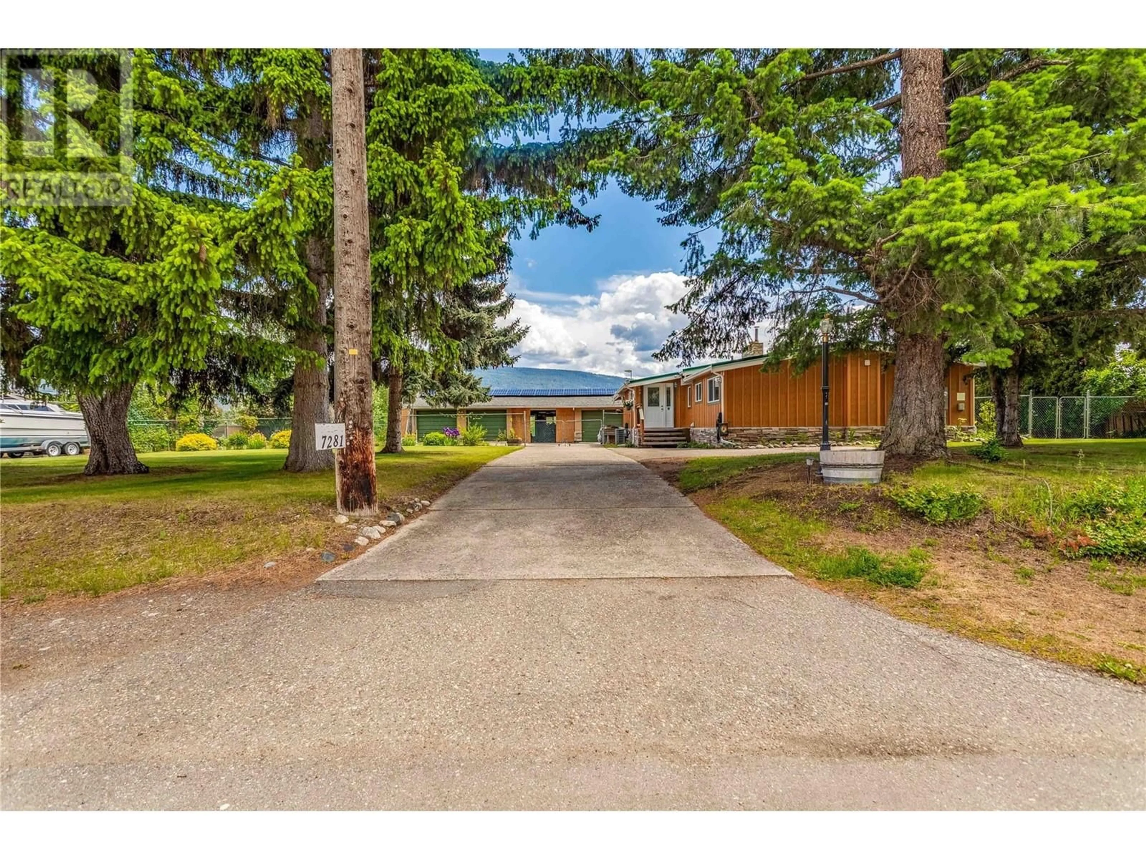 A pic from outside/outdoor area/front of a property/back of a property/a pic from drone, street for 7281 FINTRY DELTA ROAD, Fintry British Columbia V1Z3V1