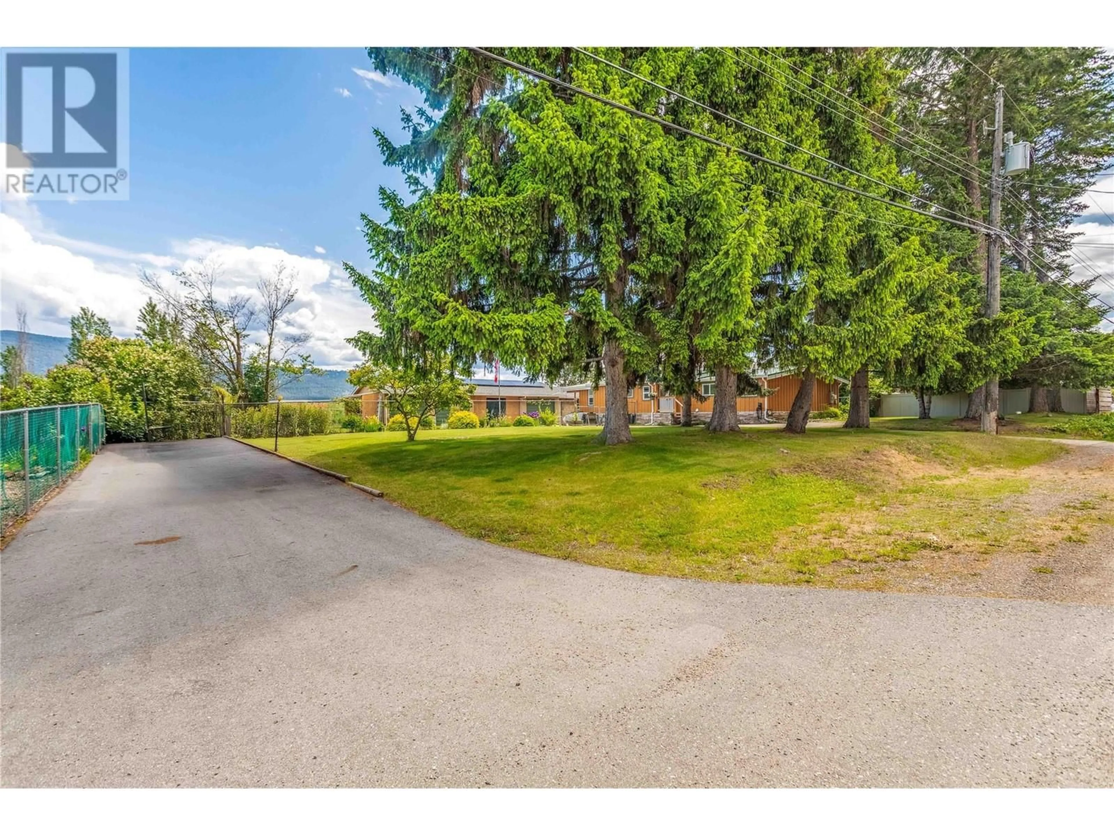 A pic from outside/outdoor area/front of a property/back of a property/a pic from drone, water/lake/river/ocean view for 7281 FINTRY DELTA ROAD, Fintry British Columbia V1Z3V1